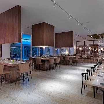 a large room with tables and chairs