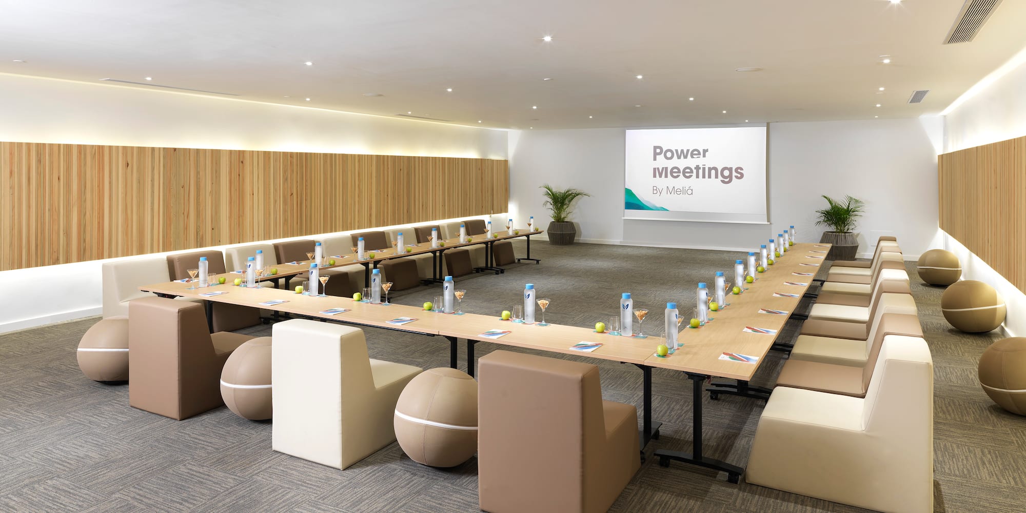 a conference room with a large table and chairs