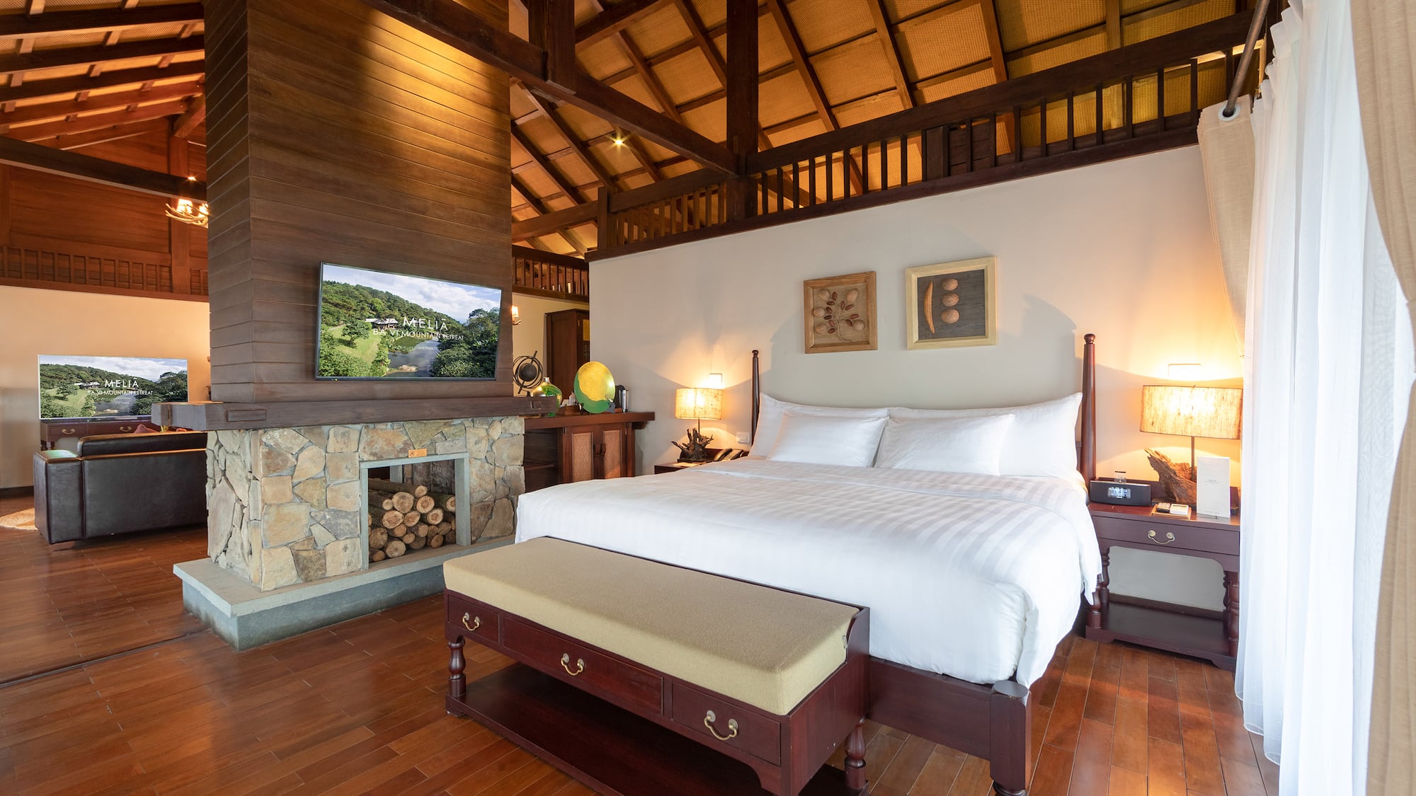 a bedroom with a wood floor and a wood ceiling