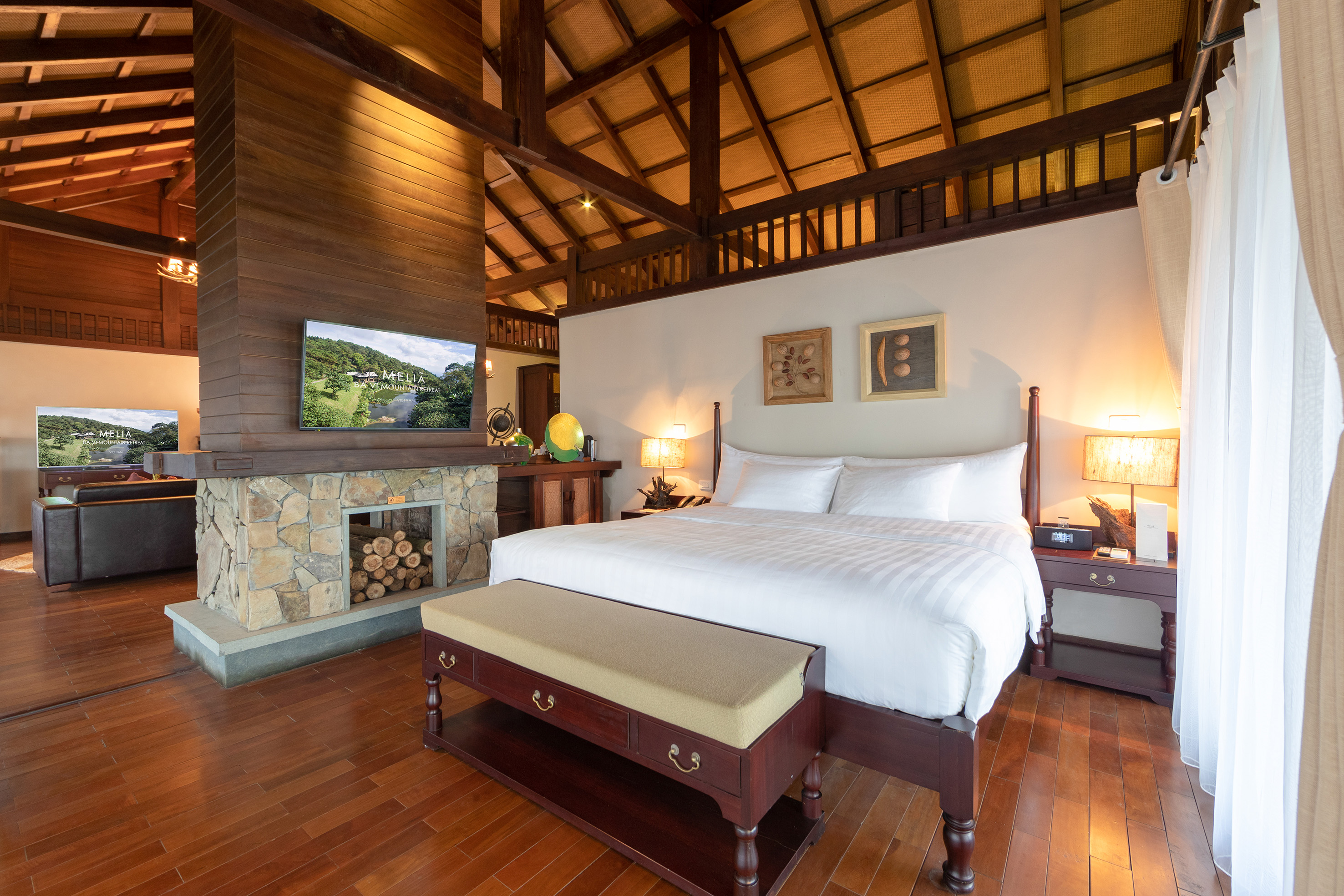 a bedroom with a wood floor and a wood ceiling