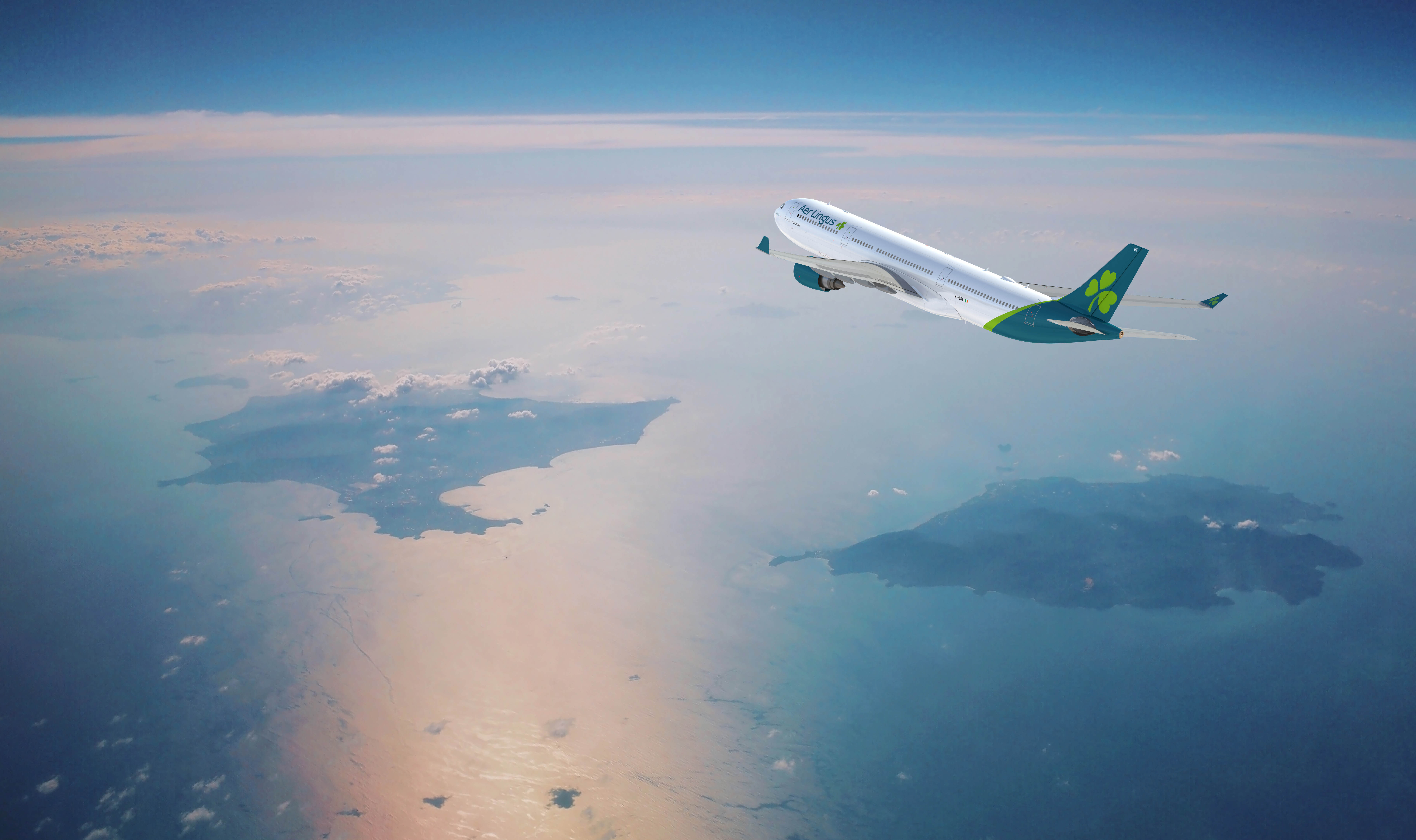 an airplane flying over the ocean