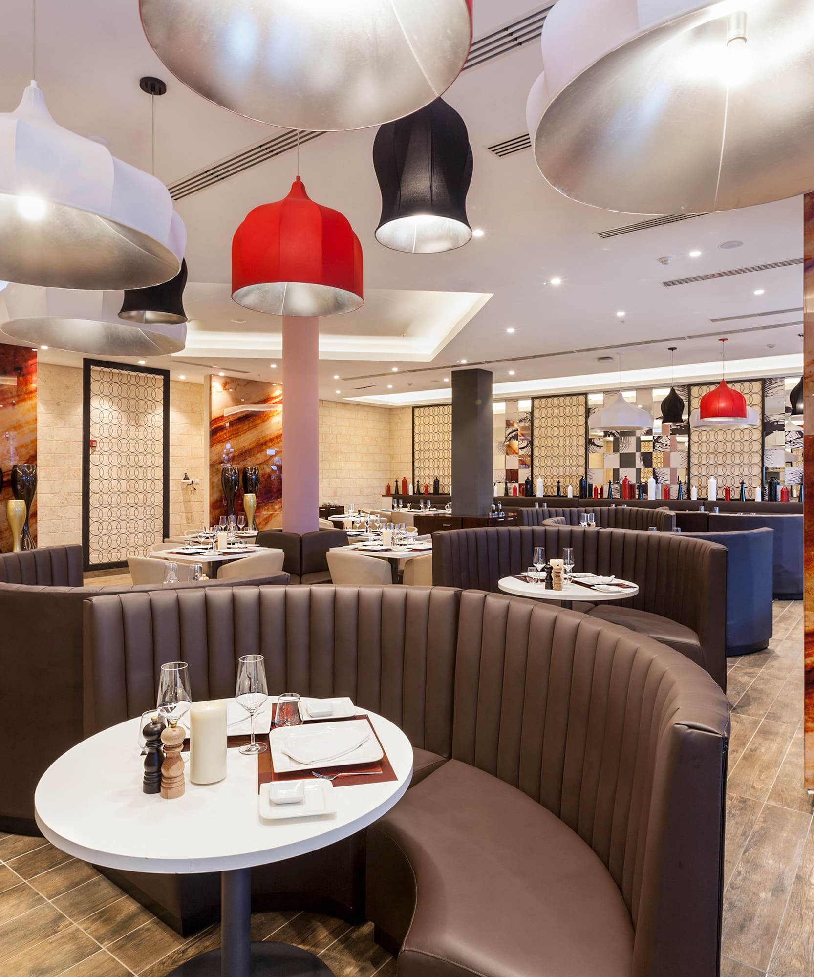 a restaurant with round tables and chairs