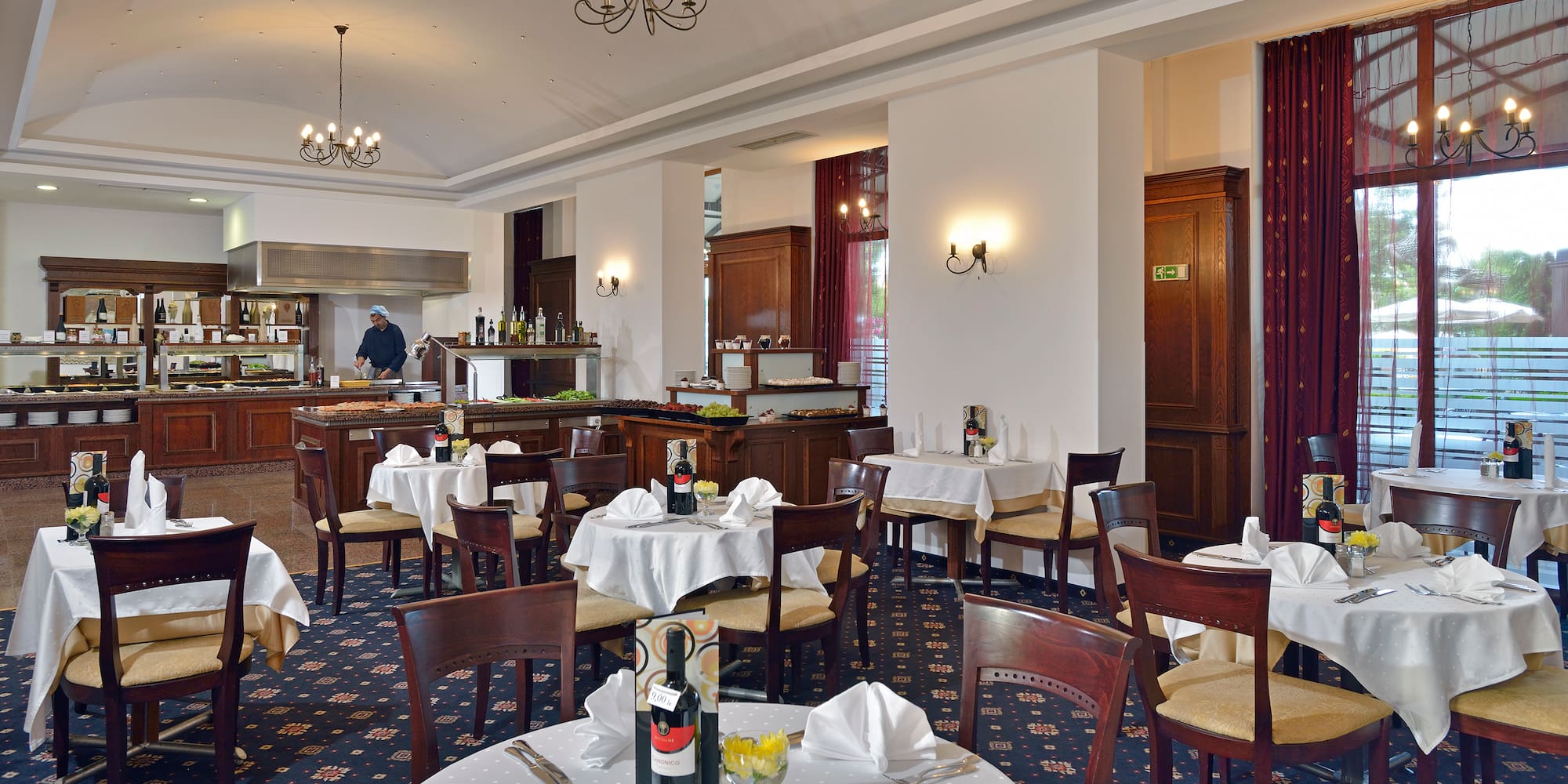 a restaurant with tables and chairs