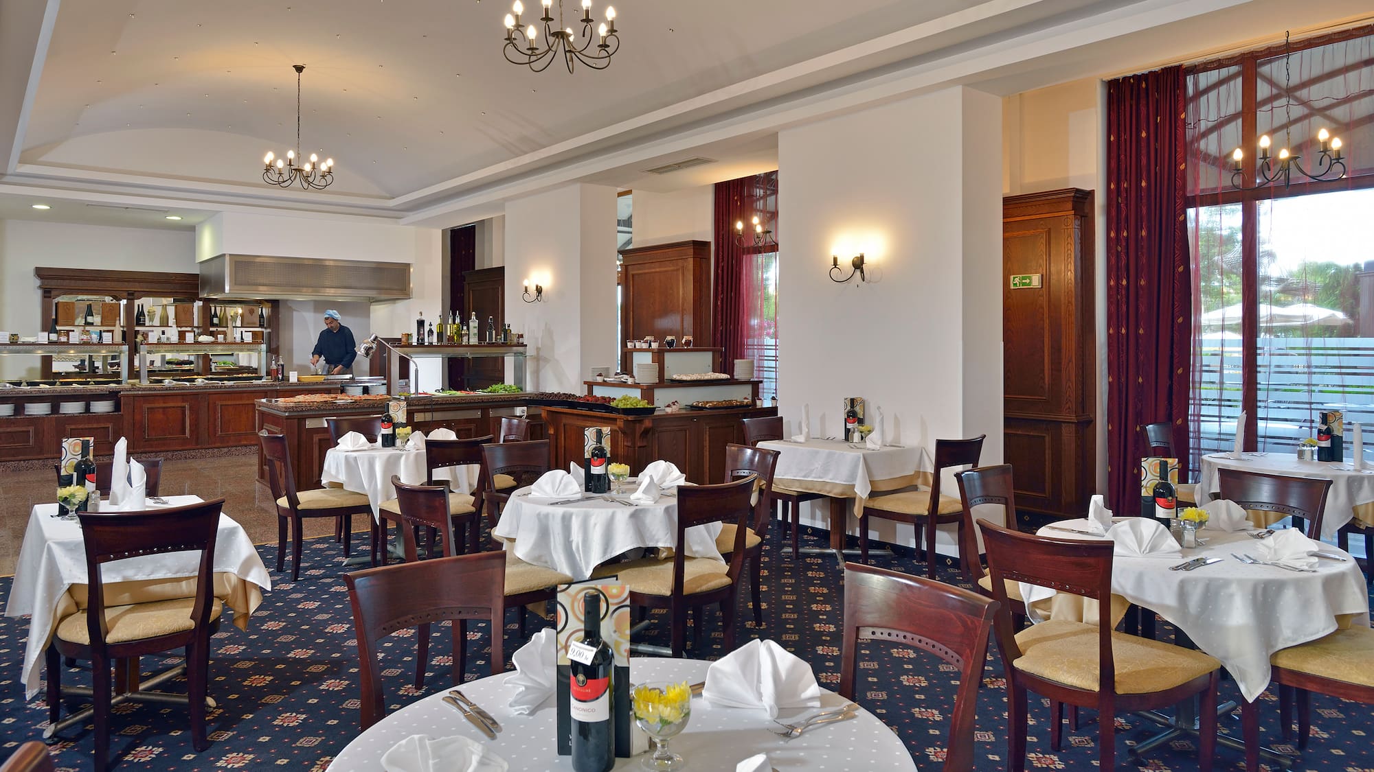 a restaurant with tables and chairs