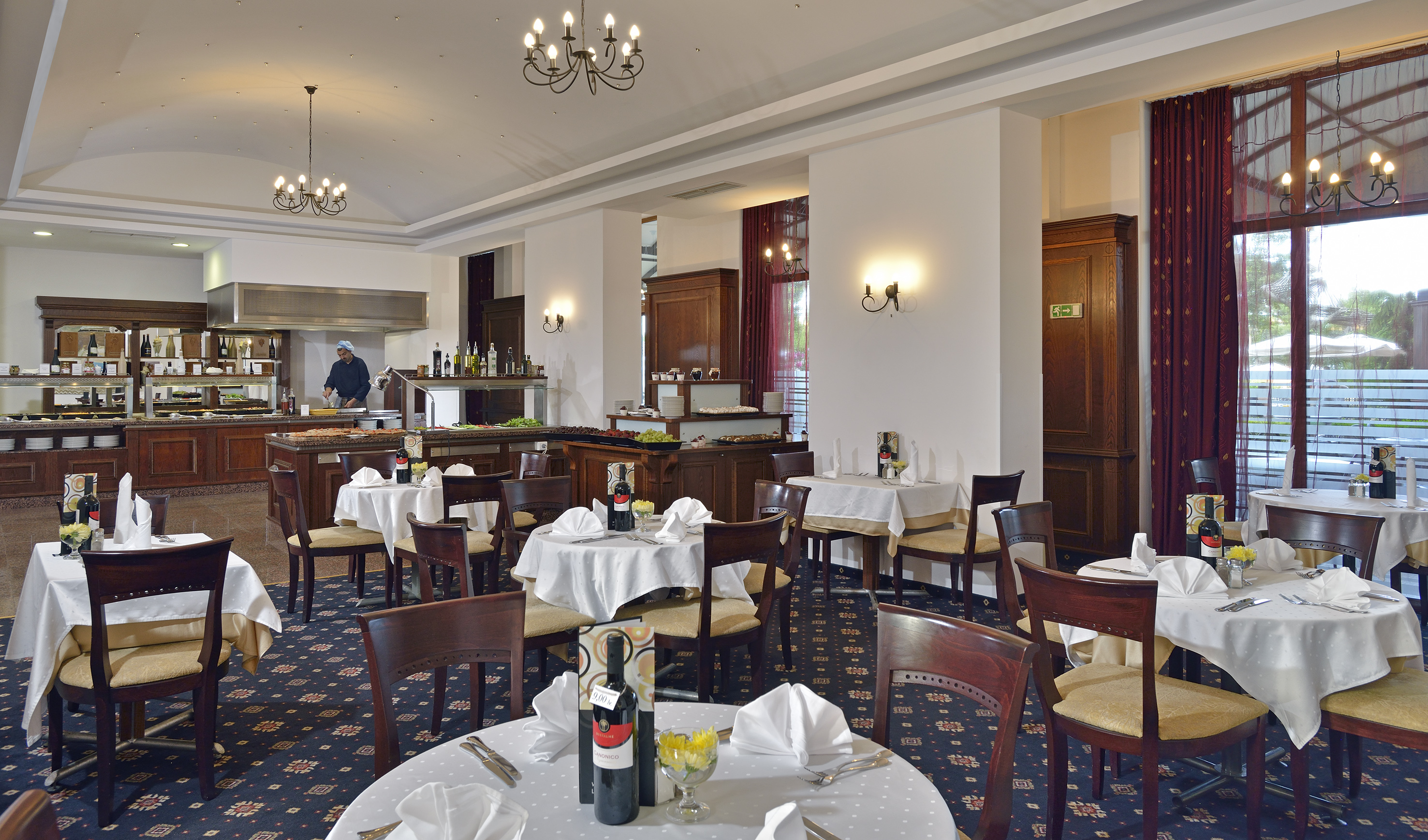 a restaurant with tables and chairs