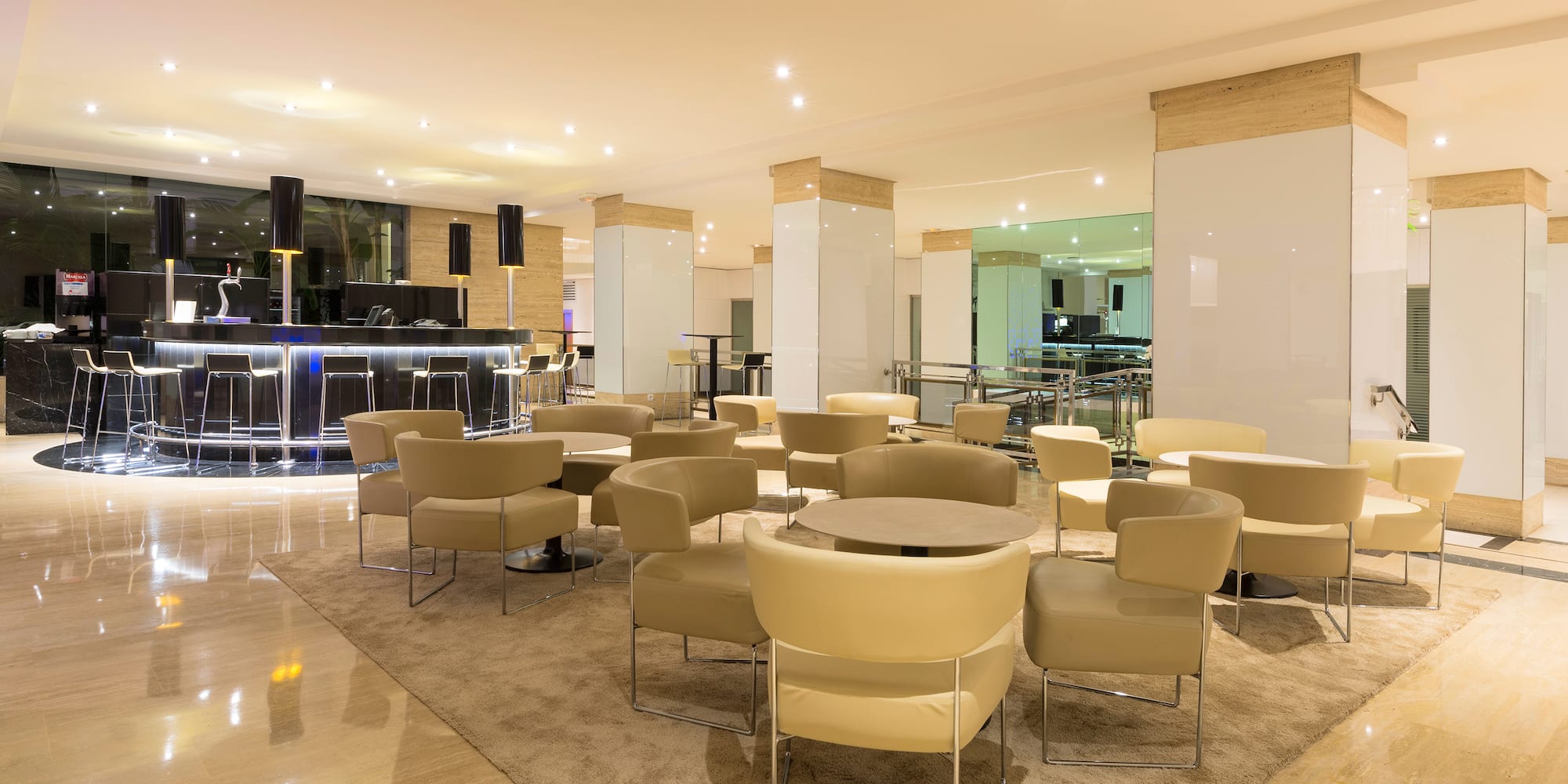 a room with a table and chairs