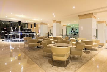 a room with a table and chairs