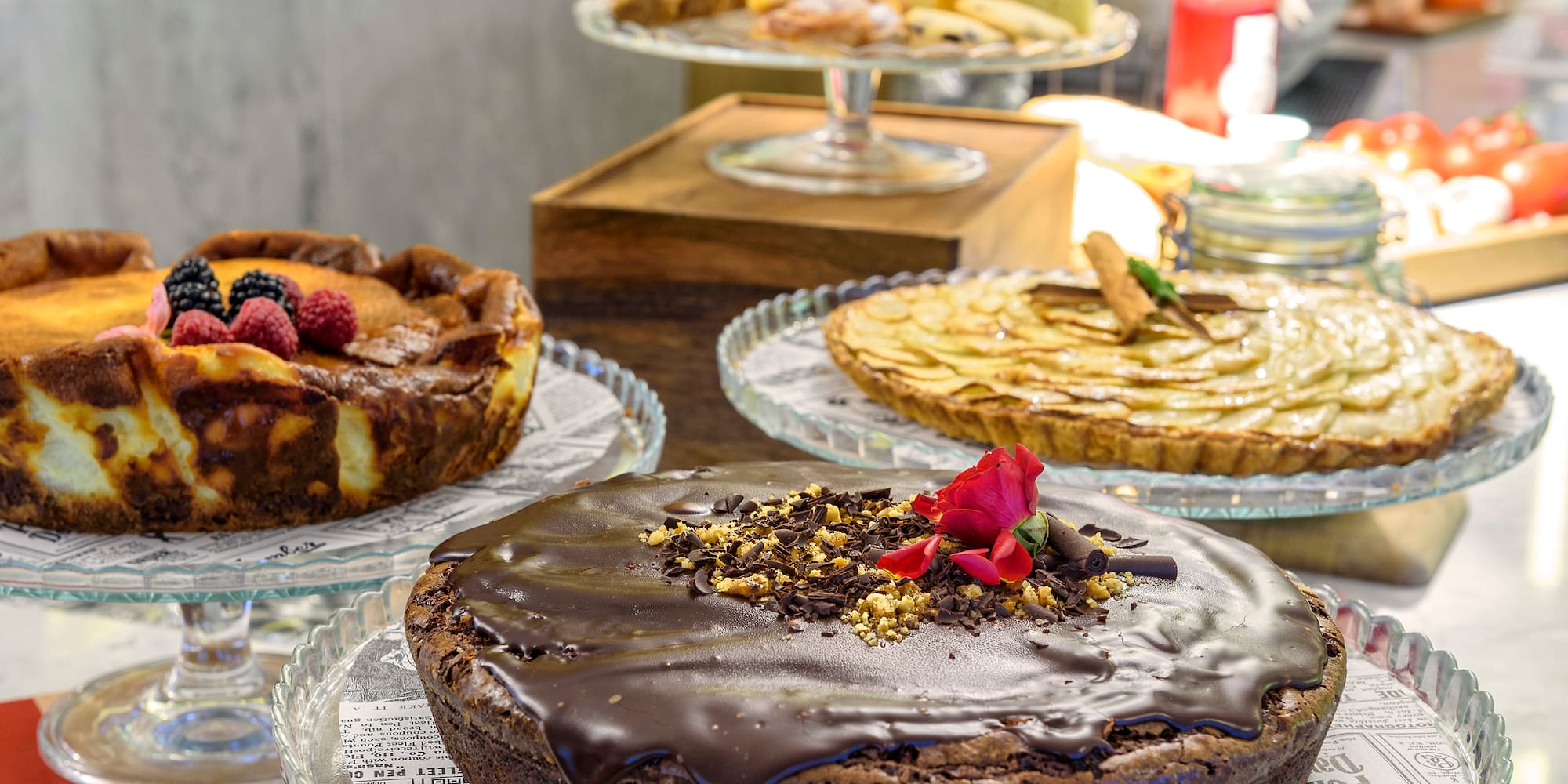 a group of desserts on plates