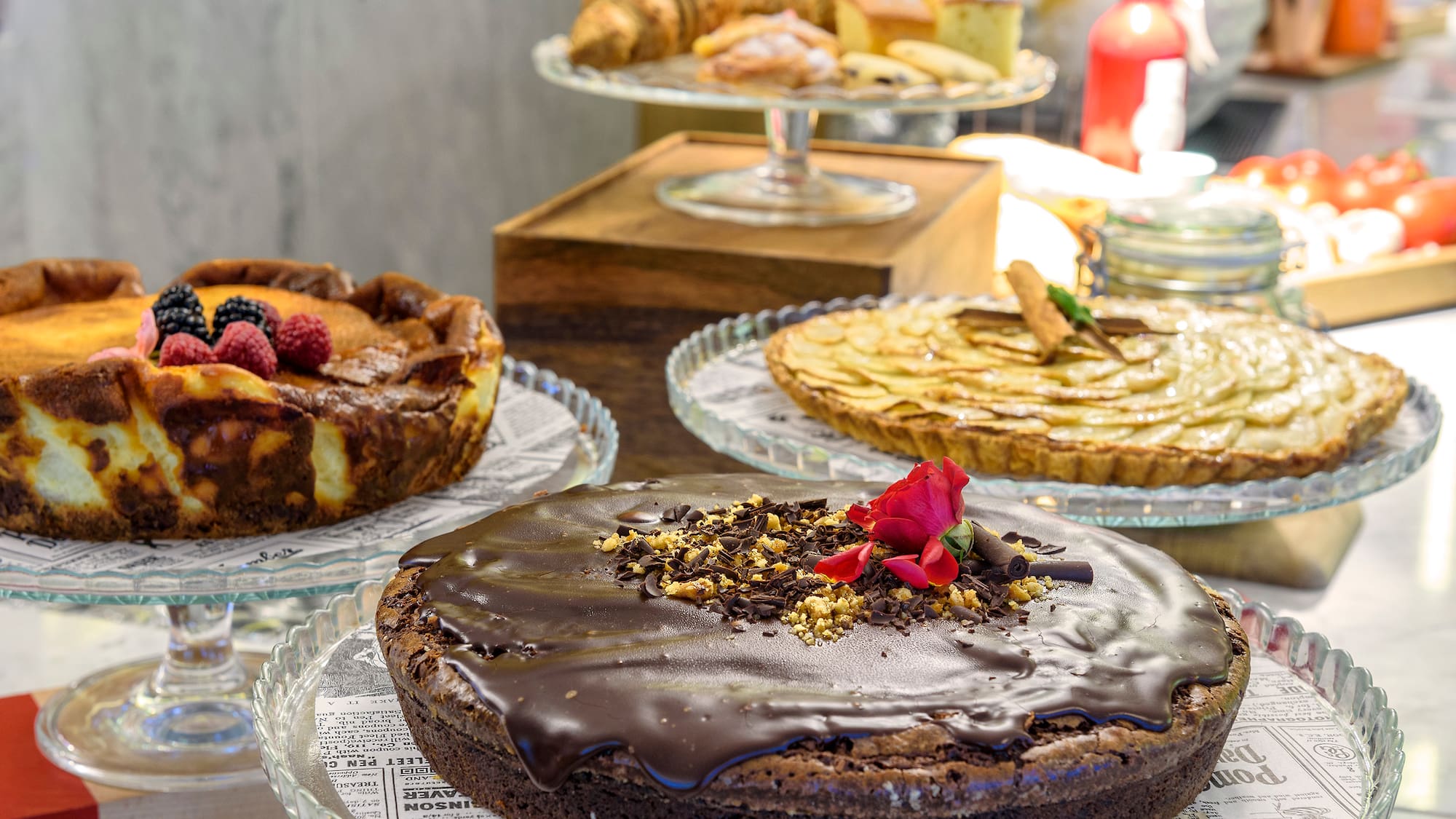 a group of desserts on plates