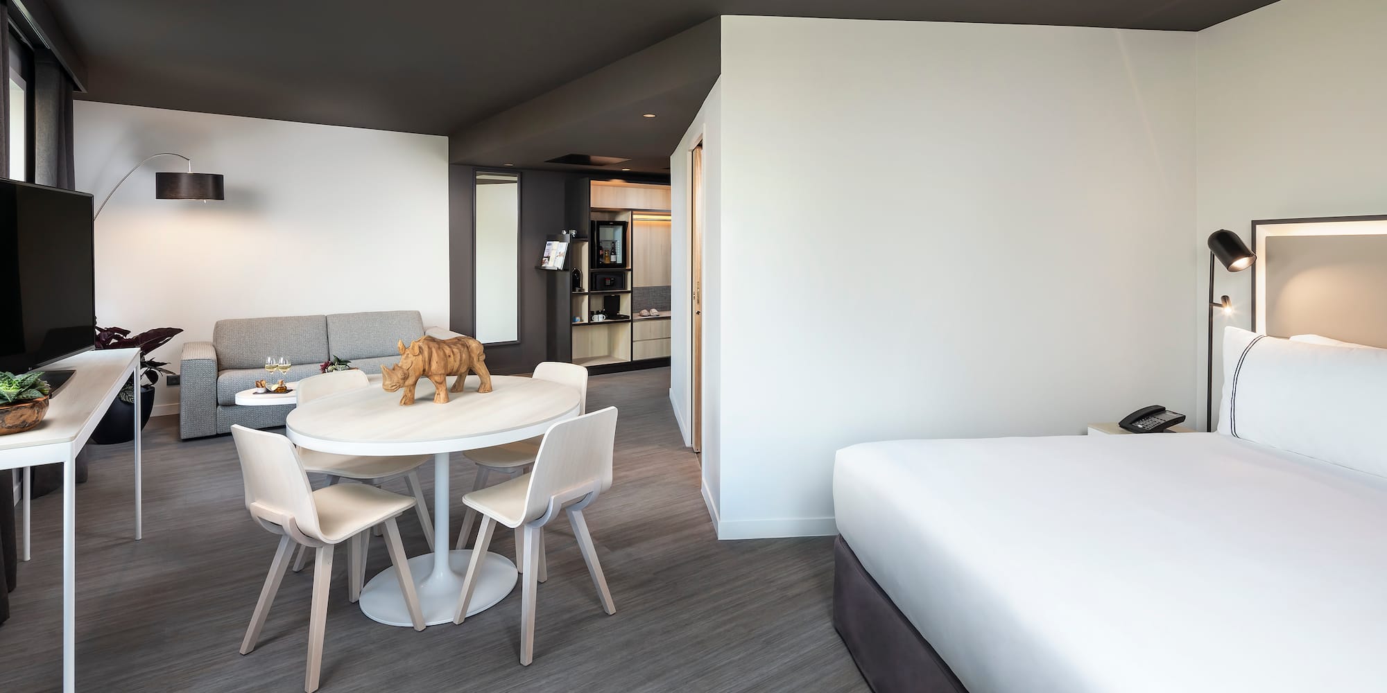 a room with a bed and a table