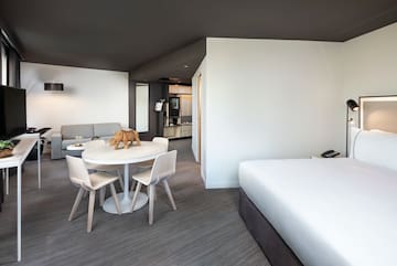 a room with a bed and a table