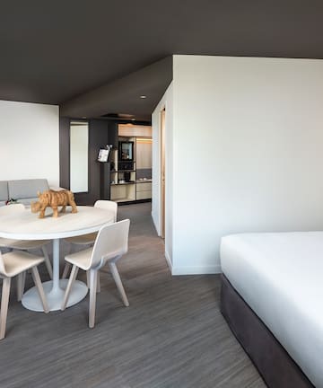 a room with a bed and a table