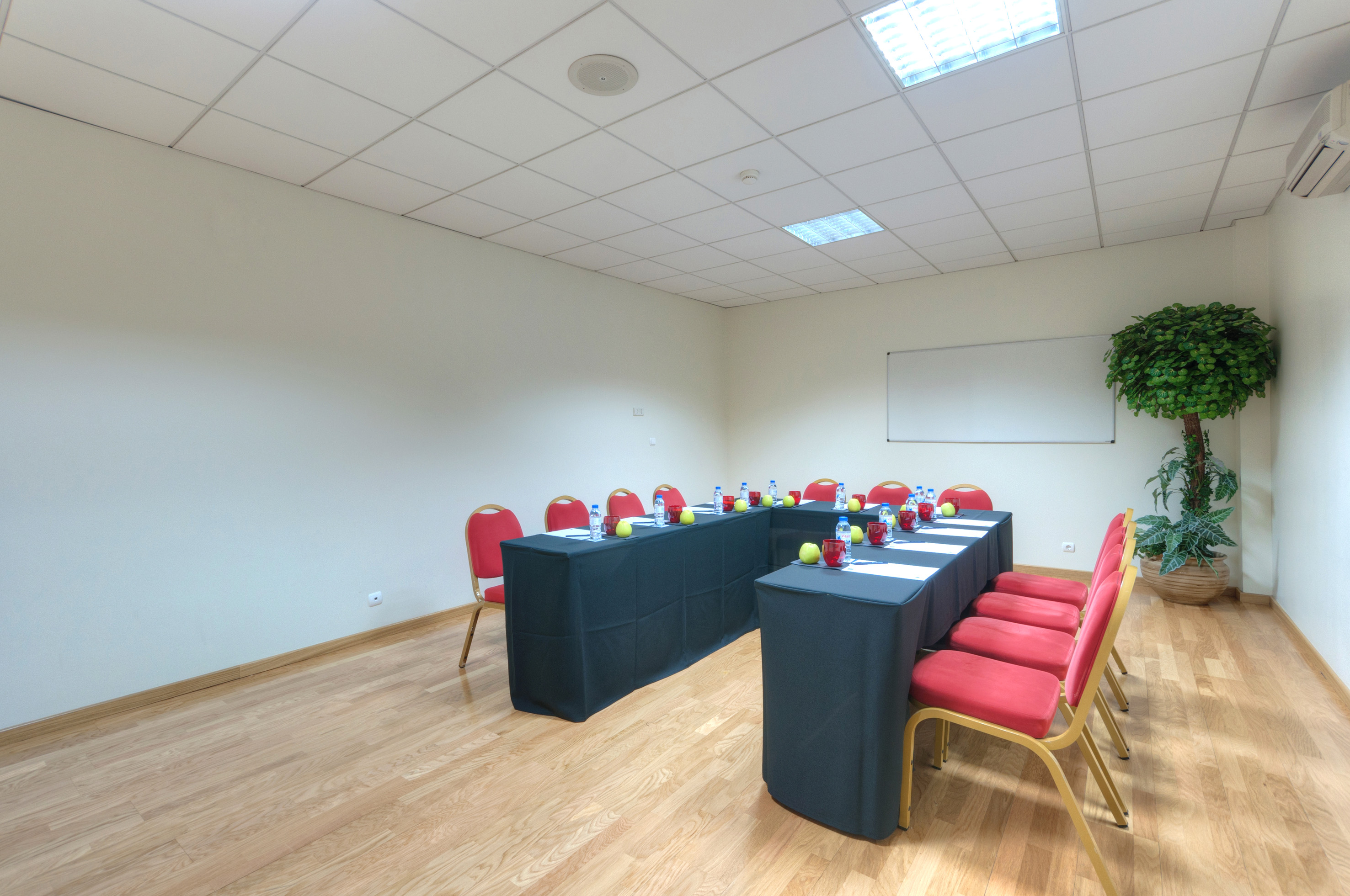 a room with tables and chairs