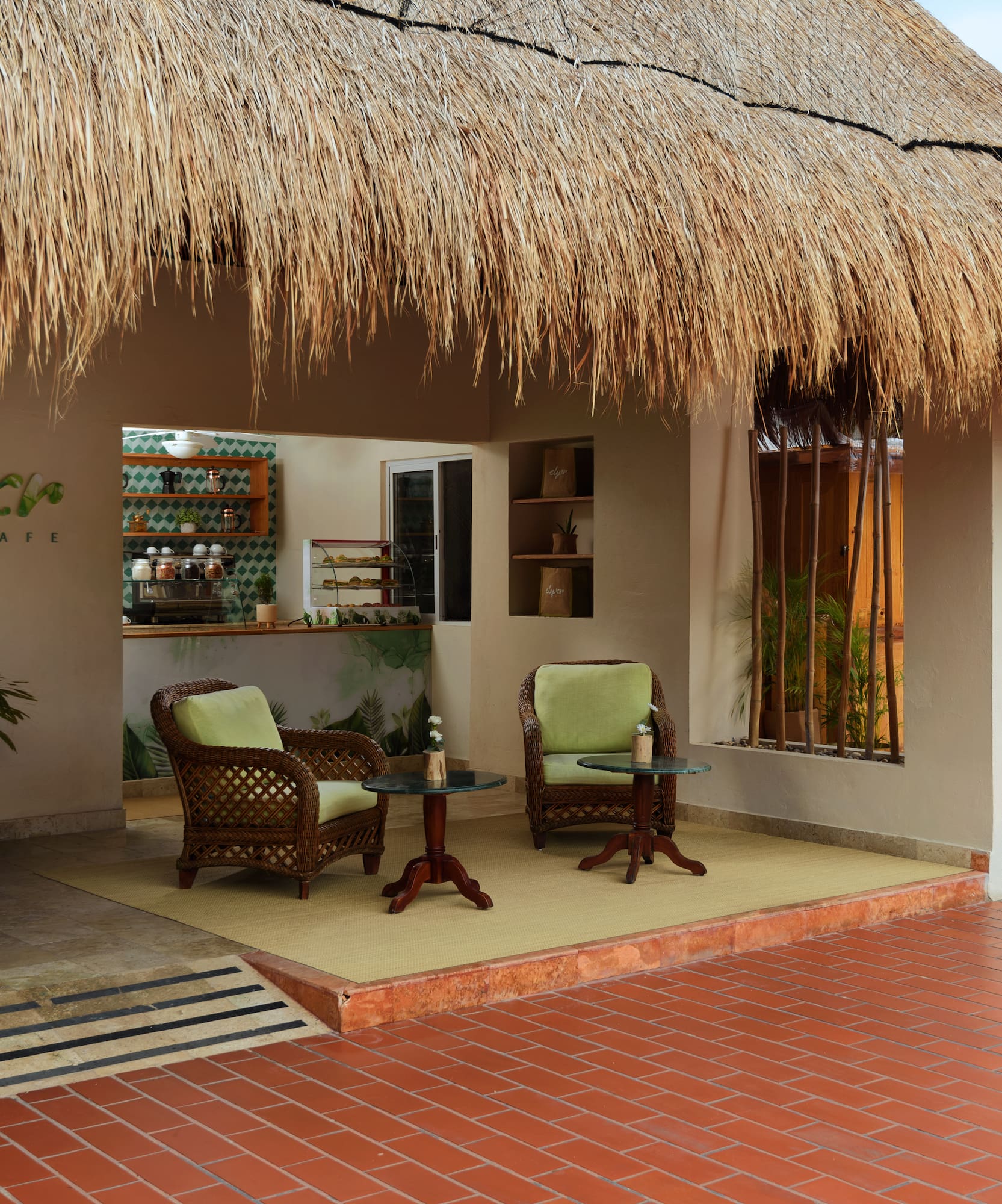 a patio with chairs and a table