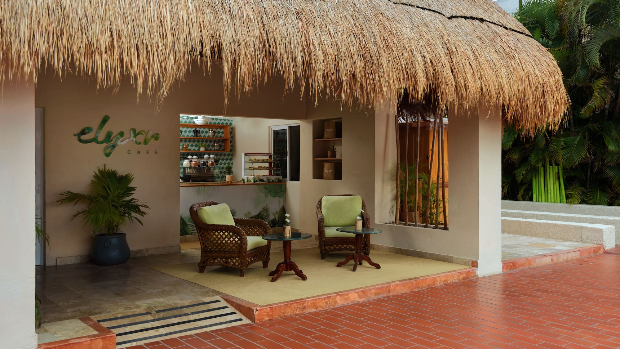 a patio with chairs and a table