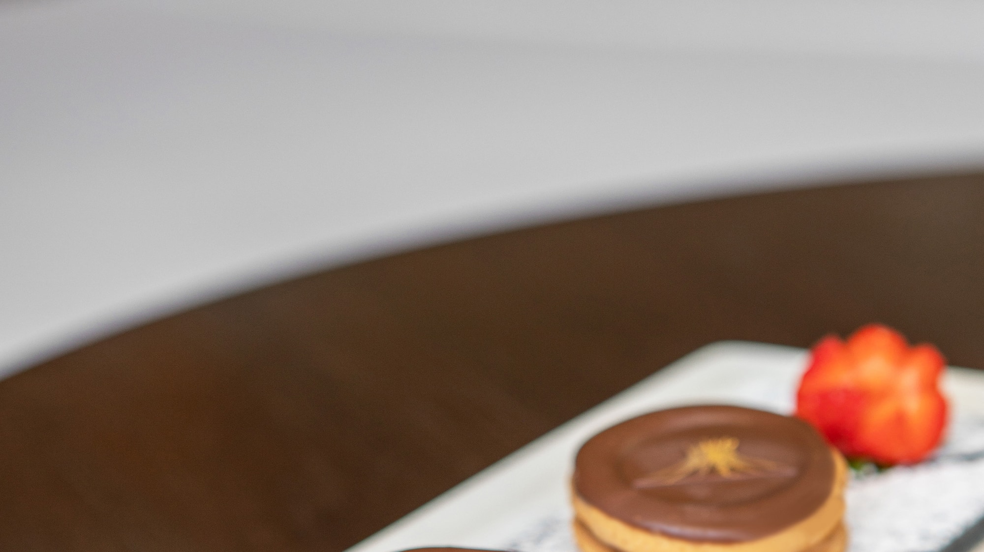 a plate of cookies with a flower on it