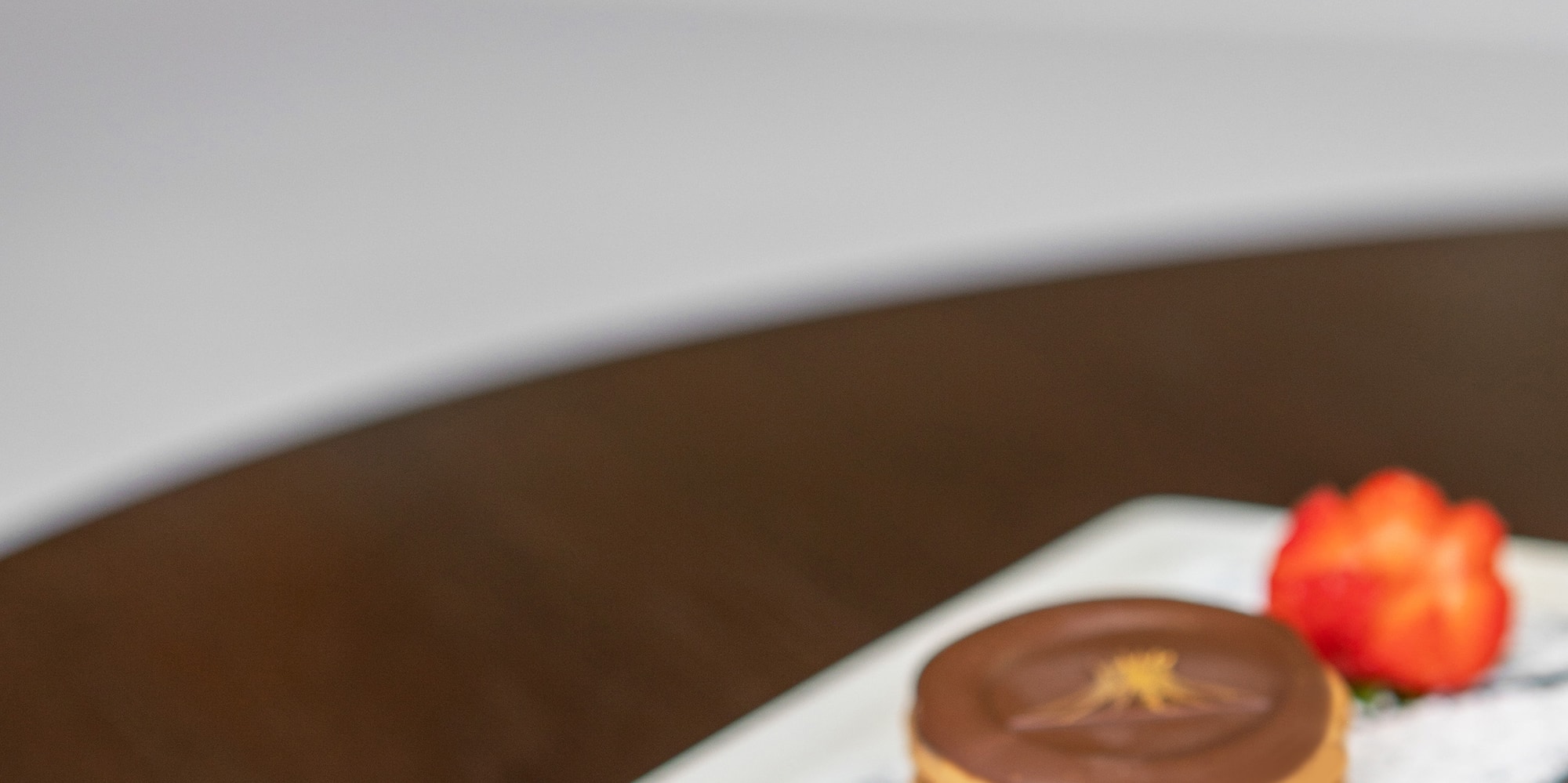a plate of cookies with a flower on it