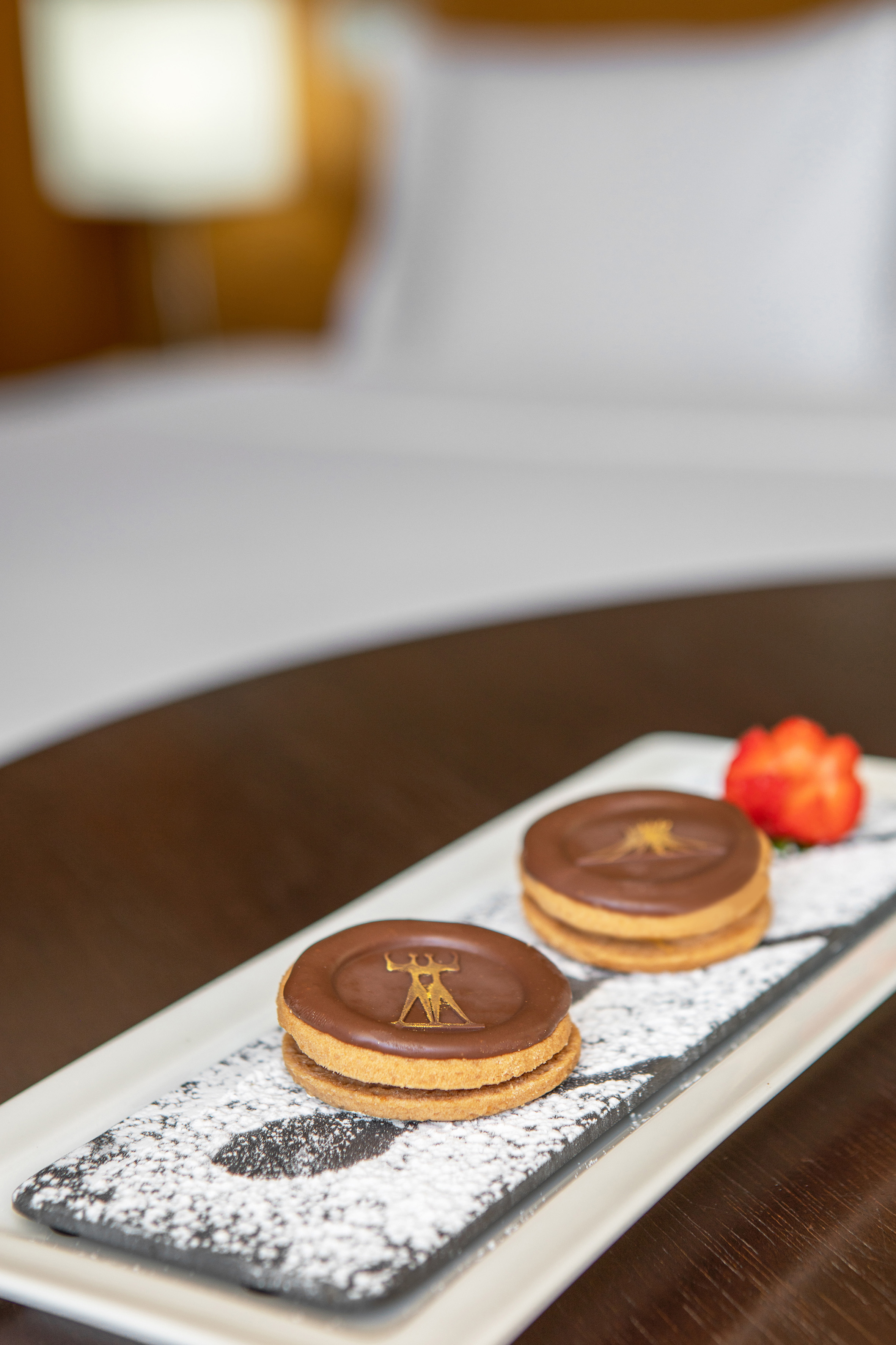 a plate of cookies with a flower on it
