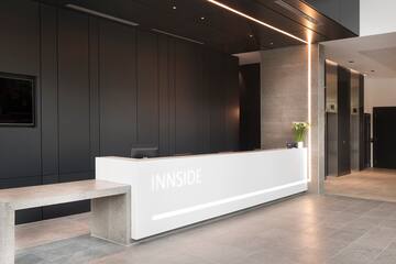 a white reception desk in a building