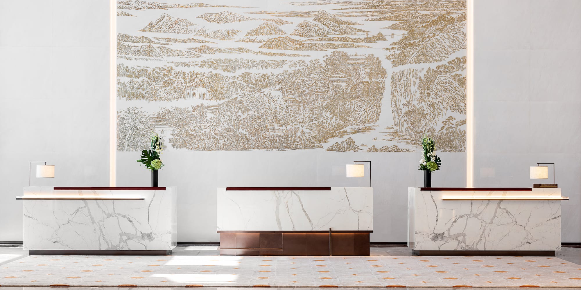 a white and gold reception desks