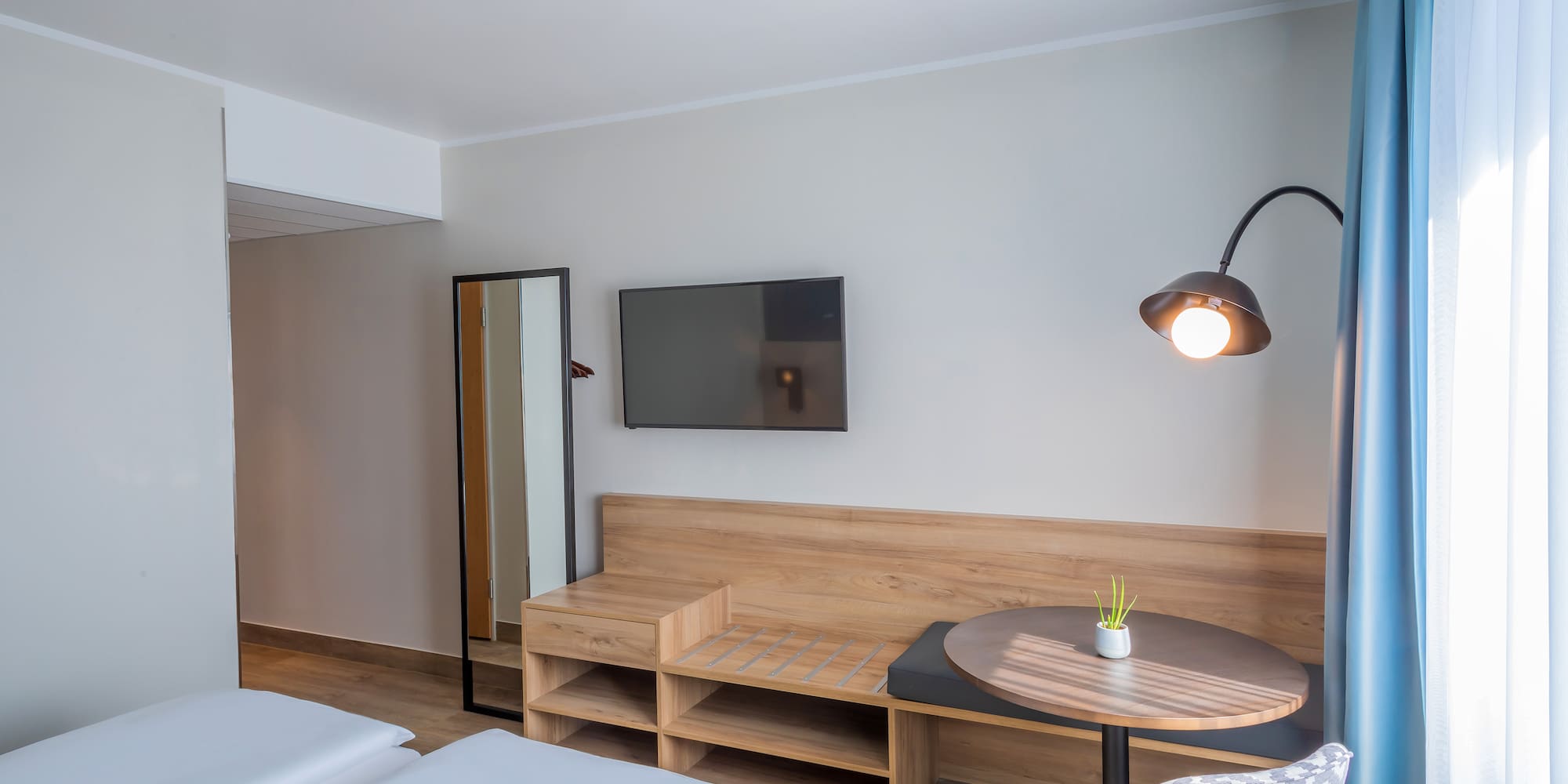 a room with a table and chairs