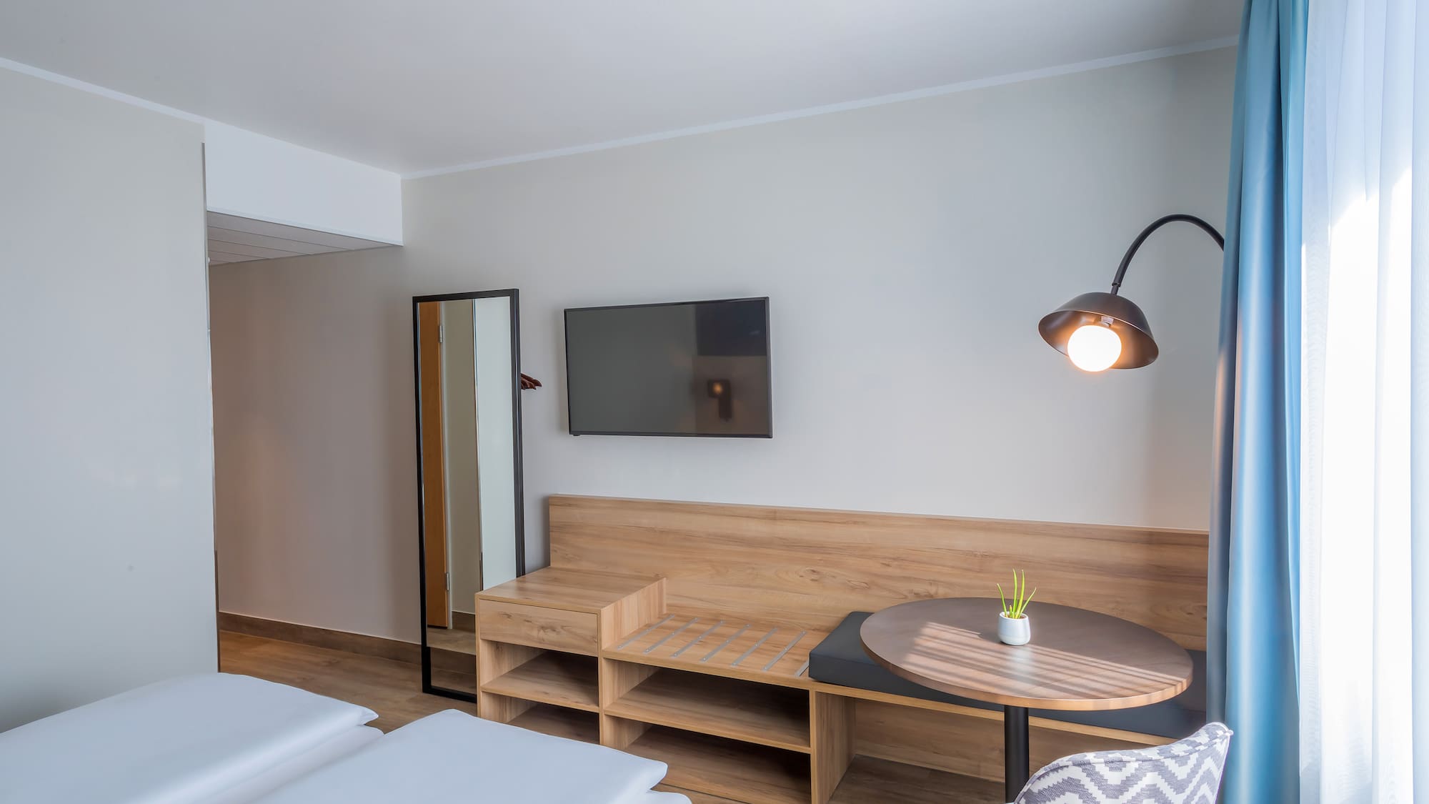 a room with a table and chairs