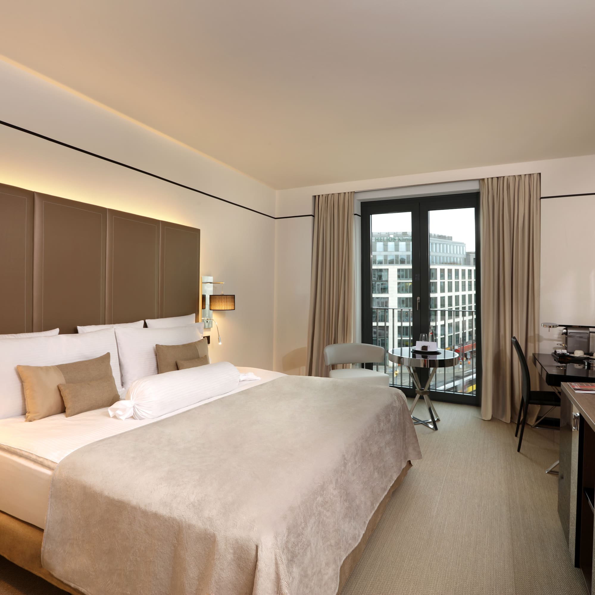 a room with a bed and desk