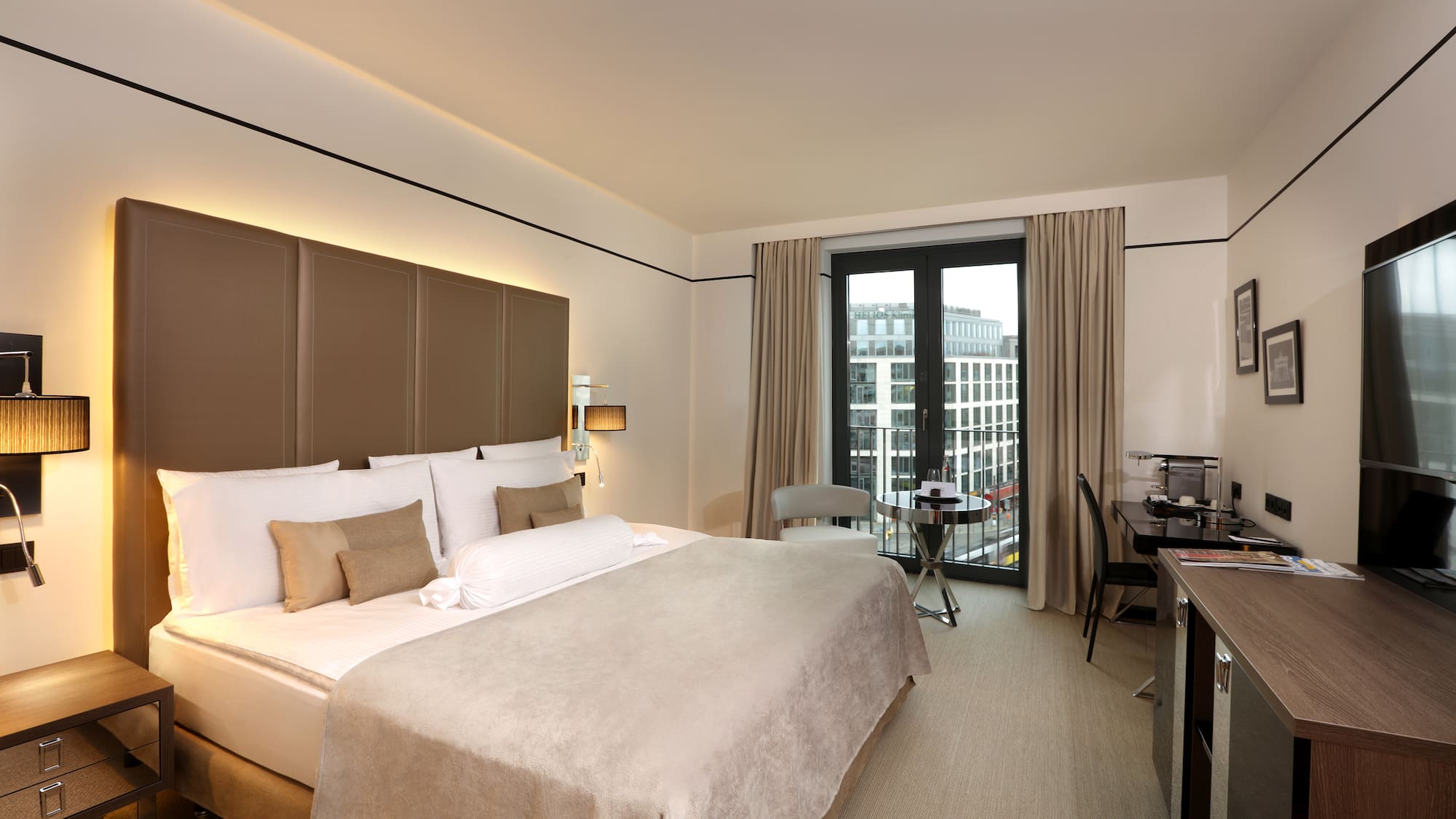 a room with a bed and desk