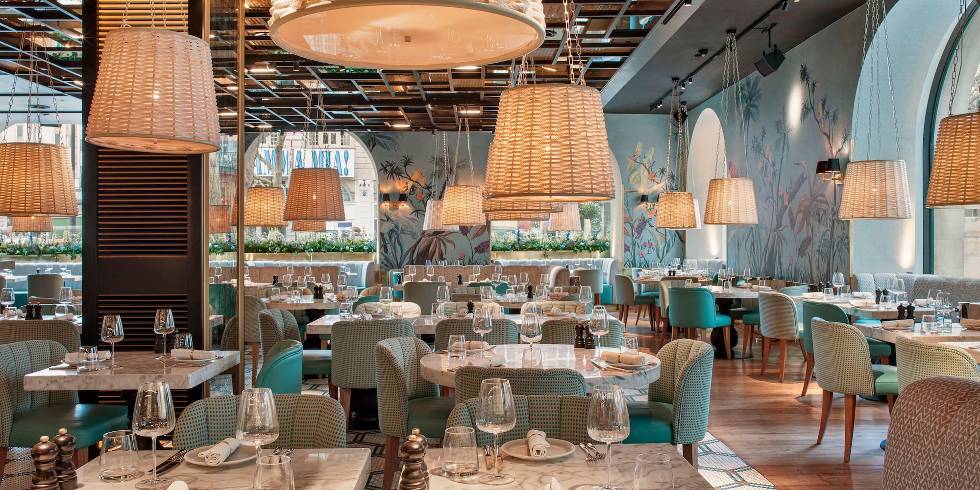 a restaurant with tables and chairs