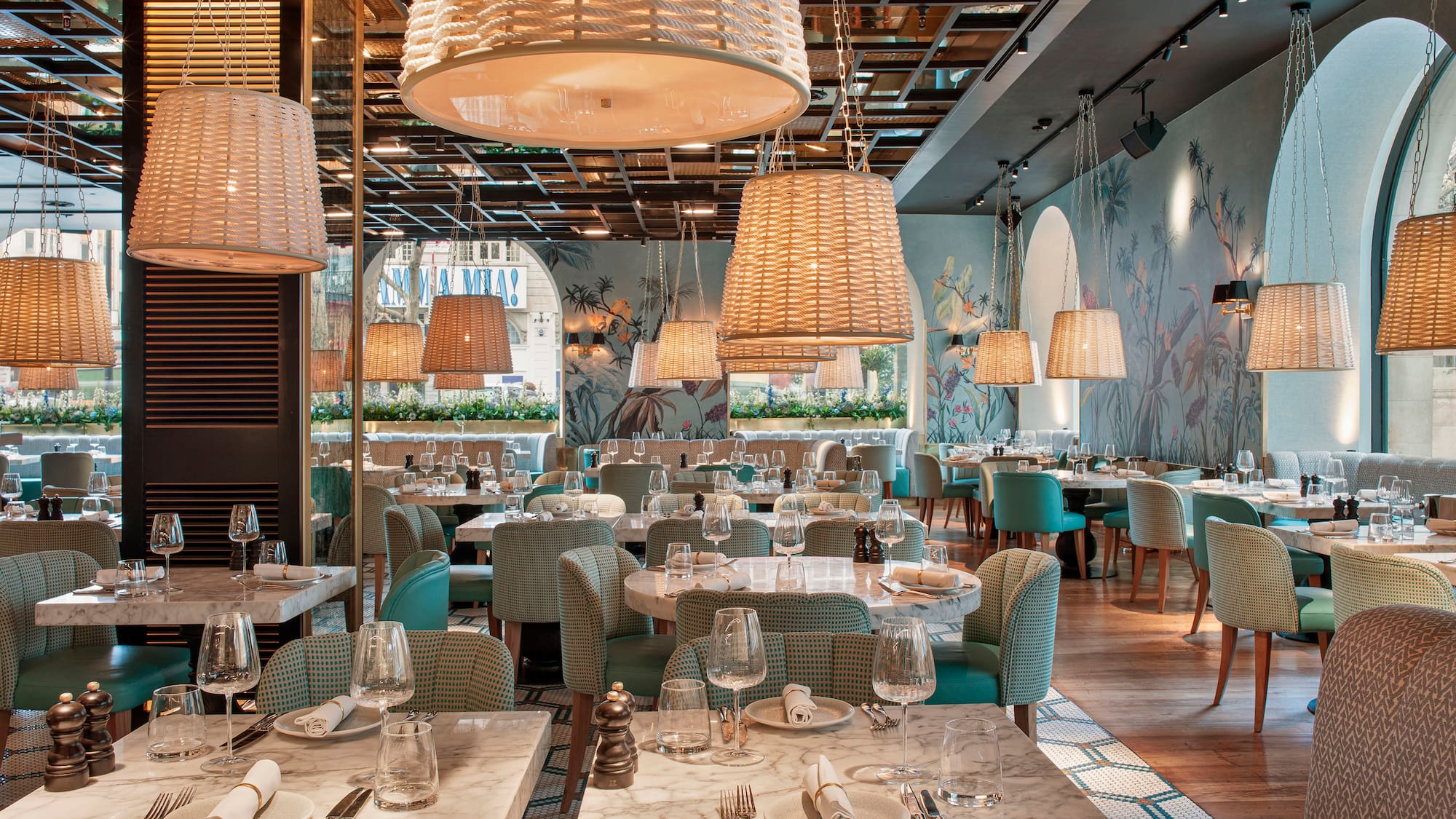 a restaurant with tables and chairs