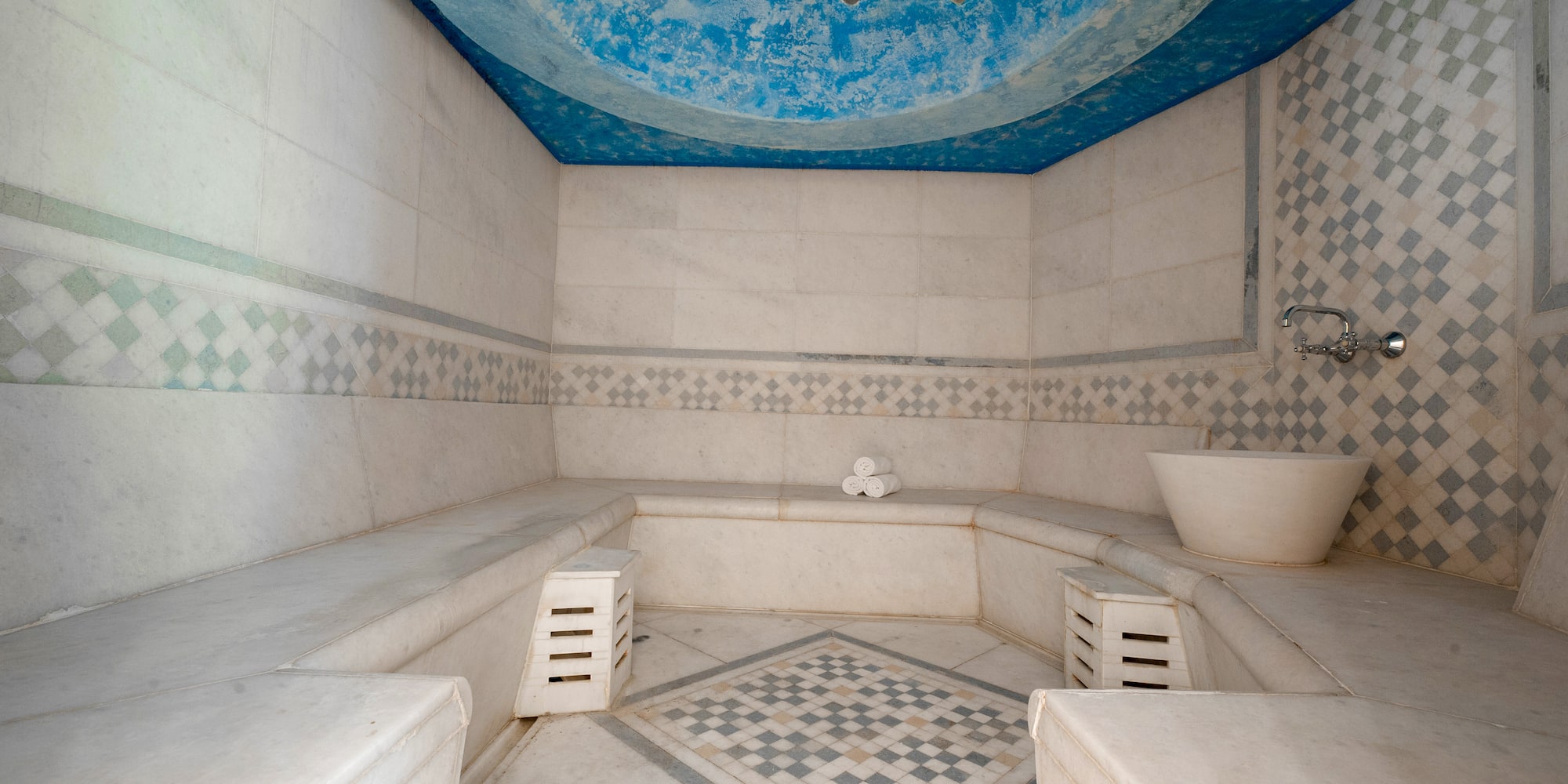 a large white and blue bathroom