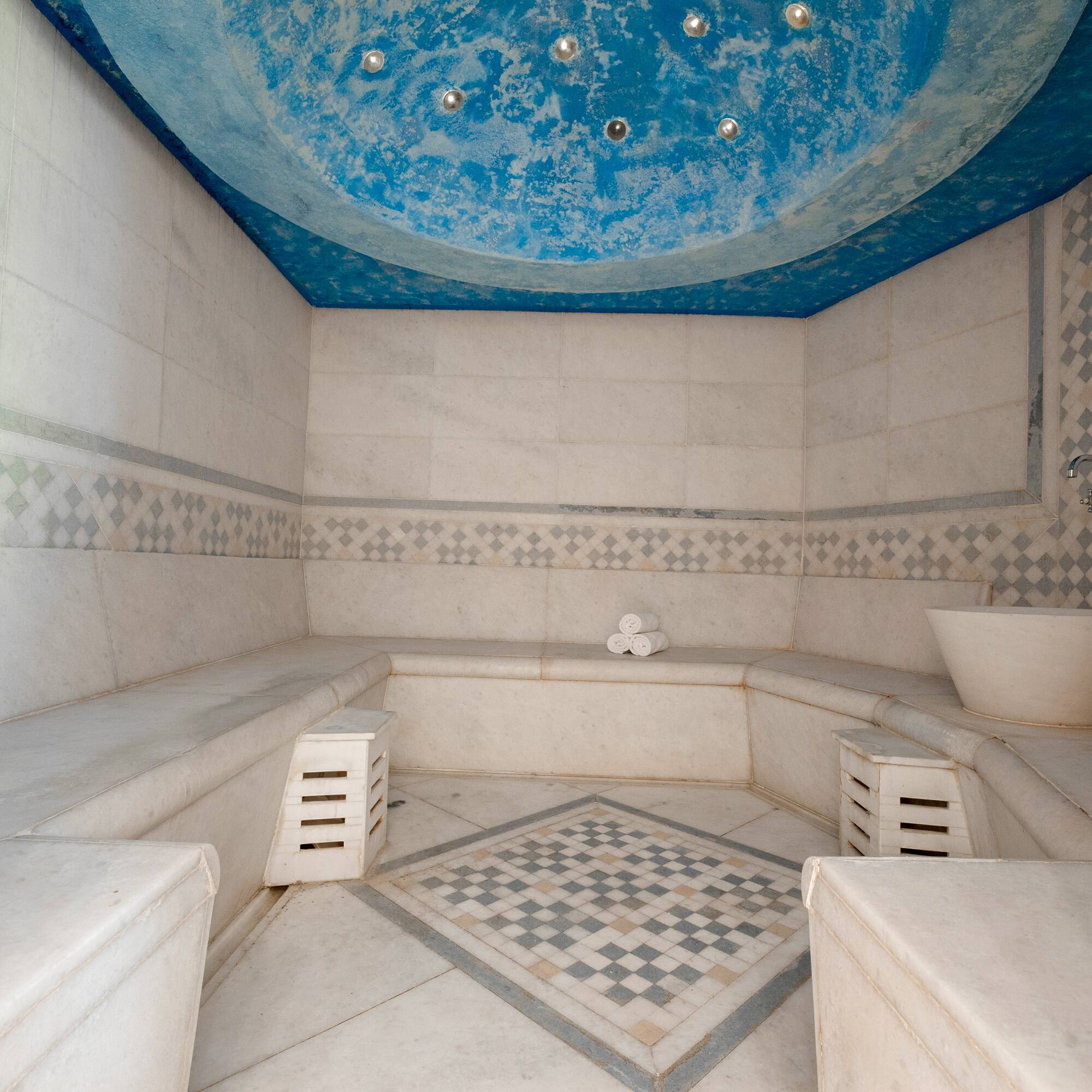a large white and blue bathroom