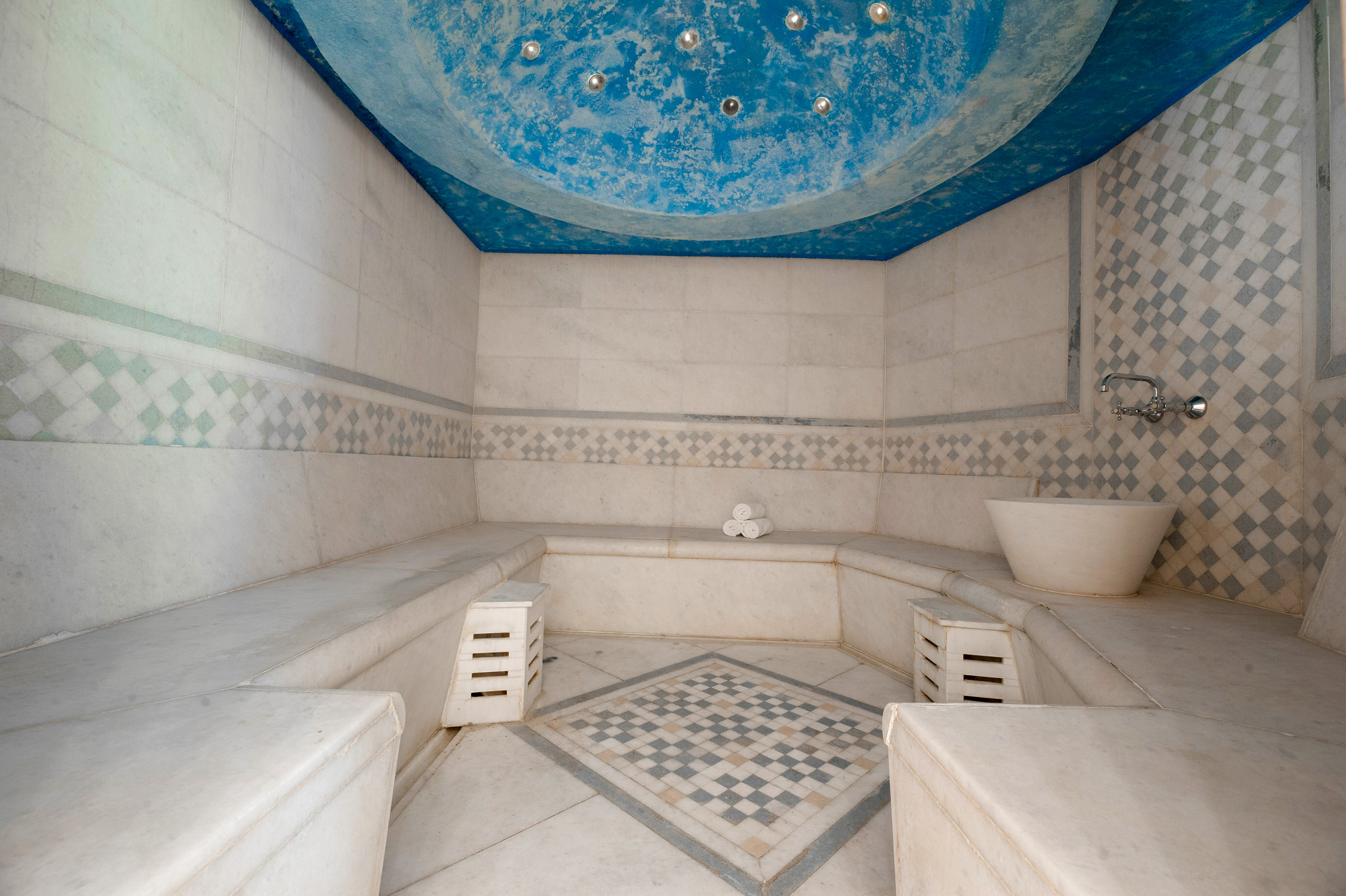 a large white and blue bathroom