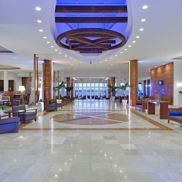 a large lobby with blue lights