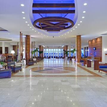 a large lobby with blue lights