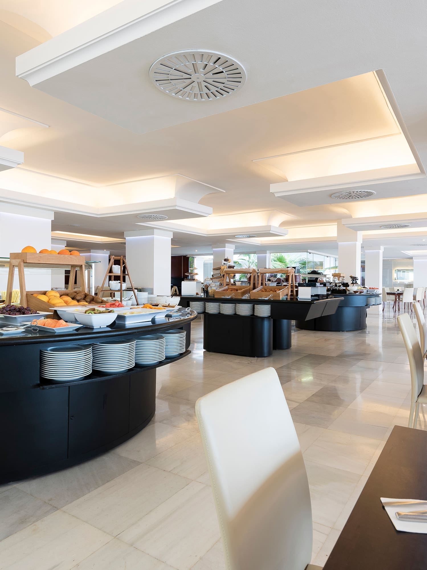 a restaurant with food on the counter