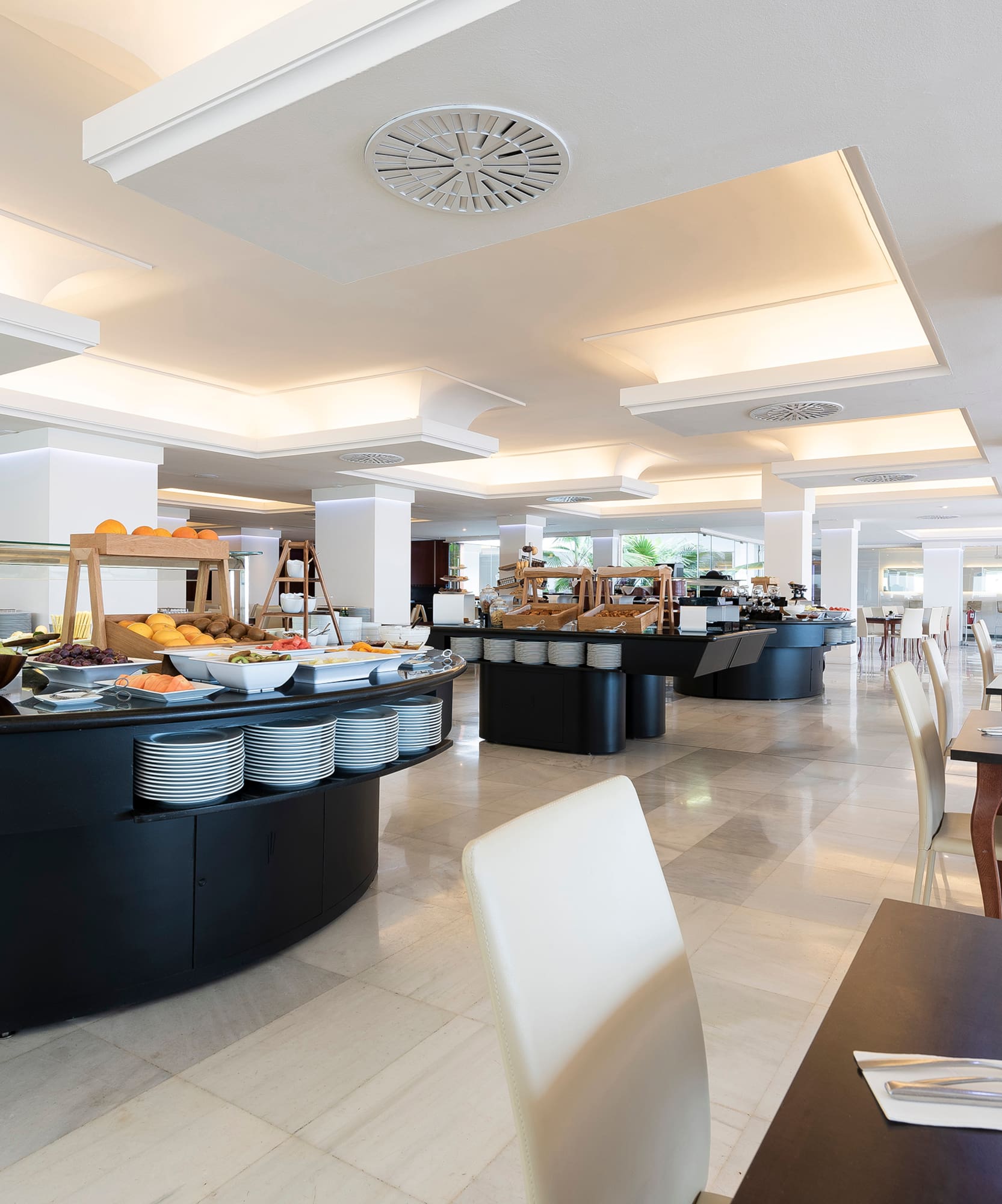 a restaurant with food on the counter