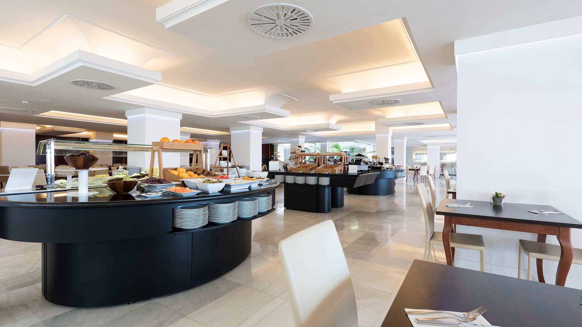 a restaurant with food on the counter