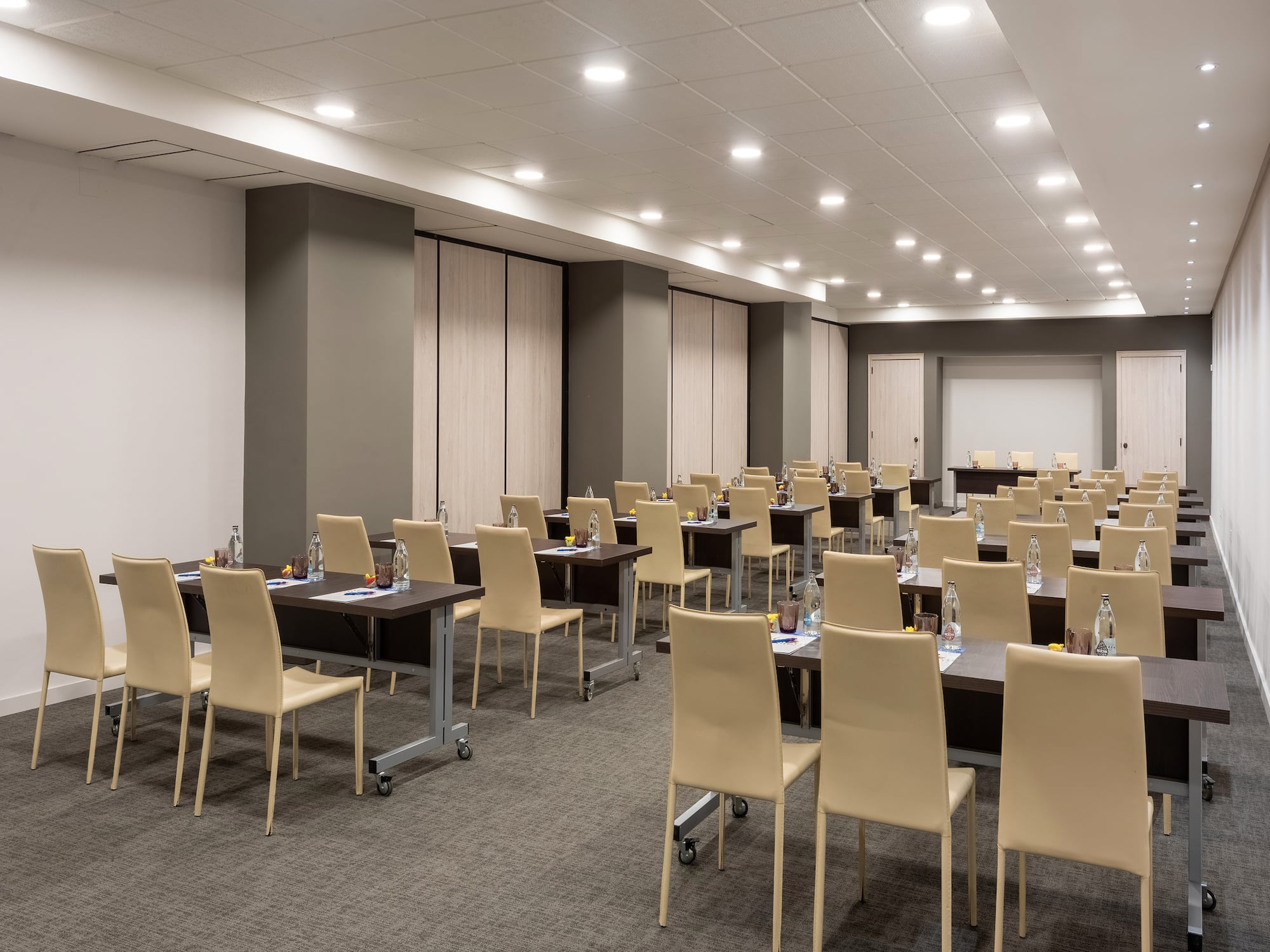 a room with tables and chairs