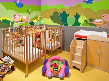 a baby cribs in a nursery