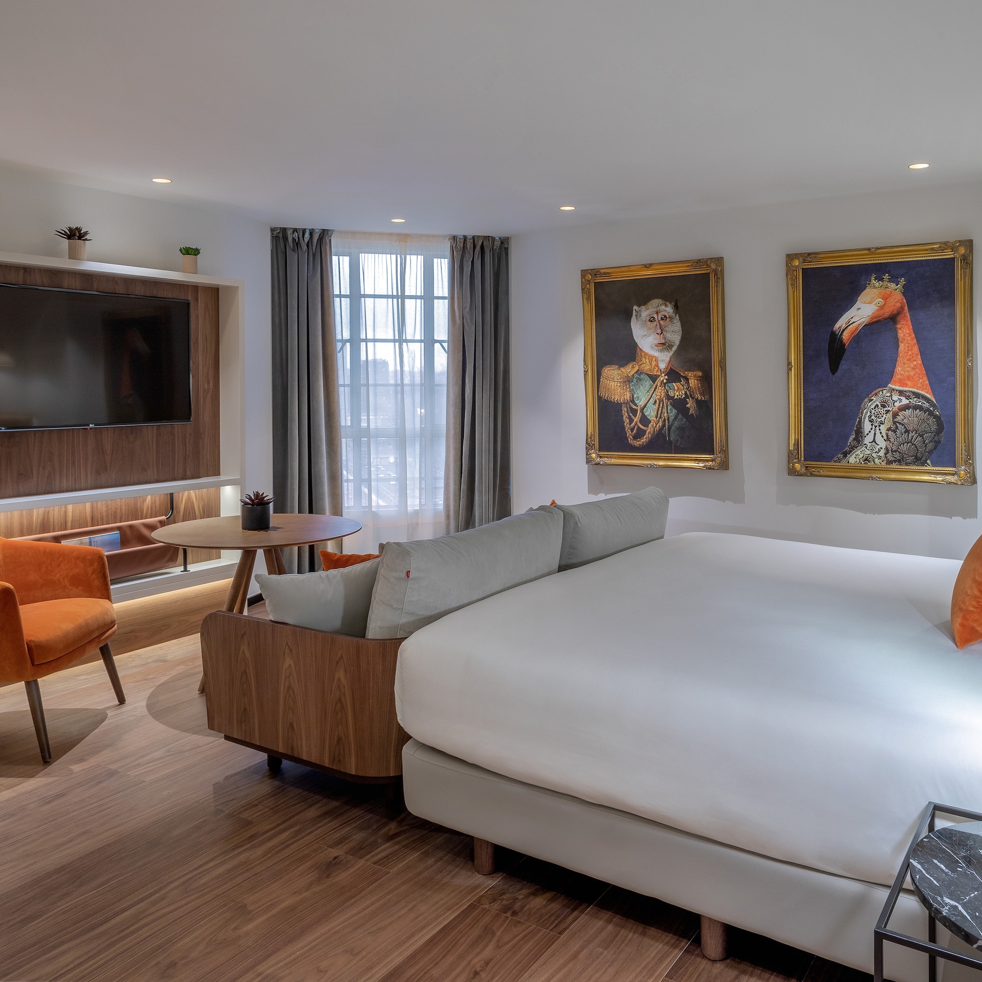 a room with a bed and a television