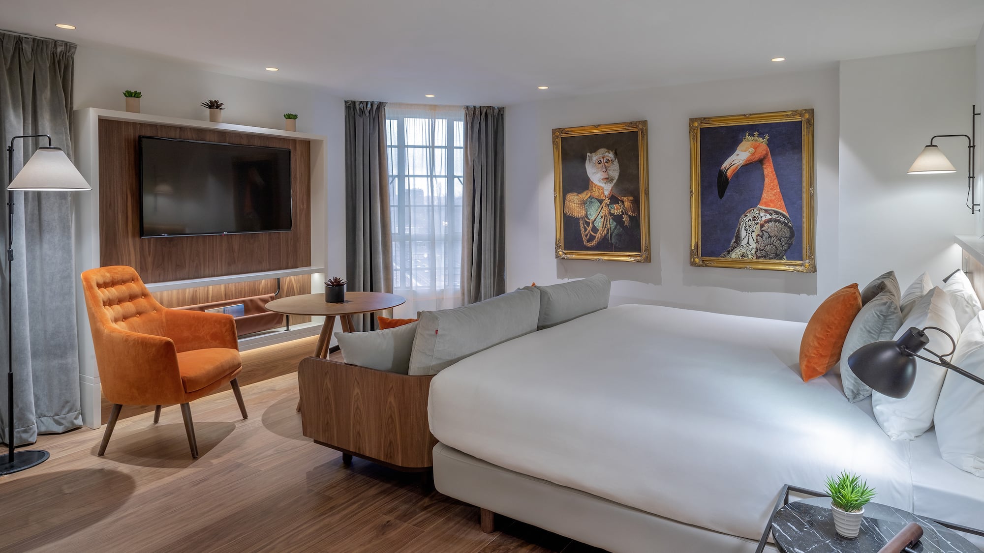 a room with a bed and a television