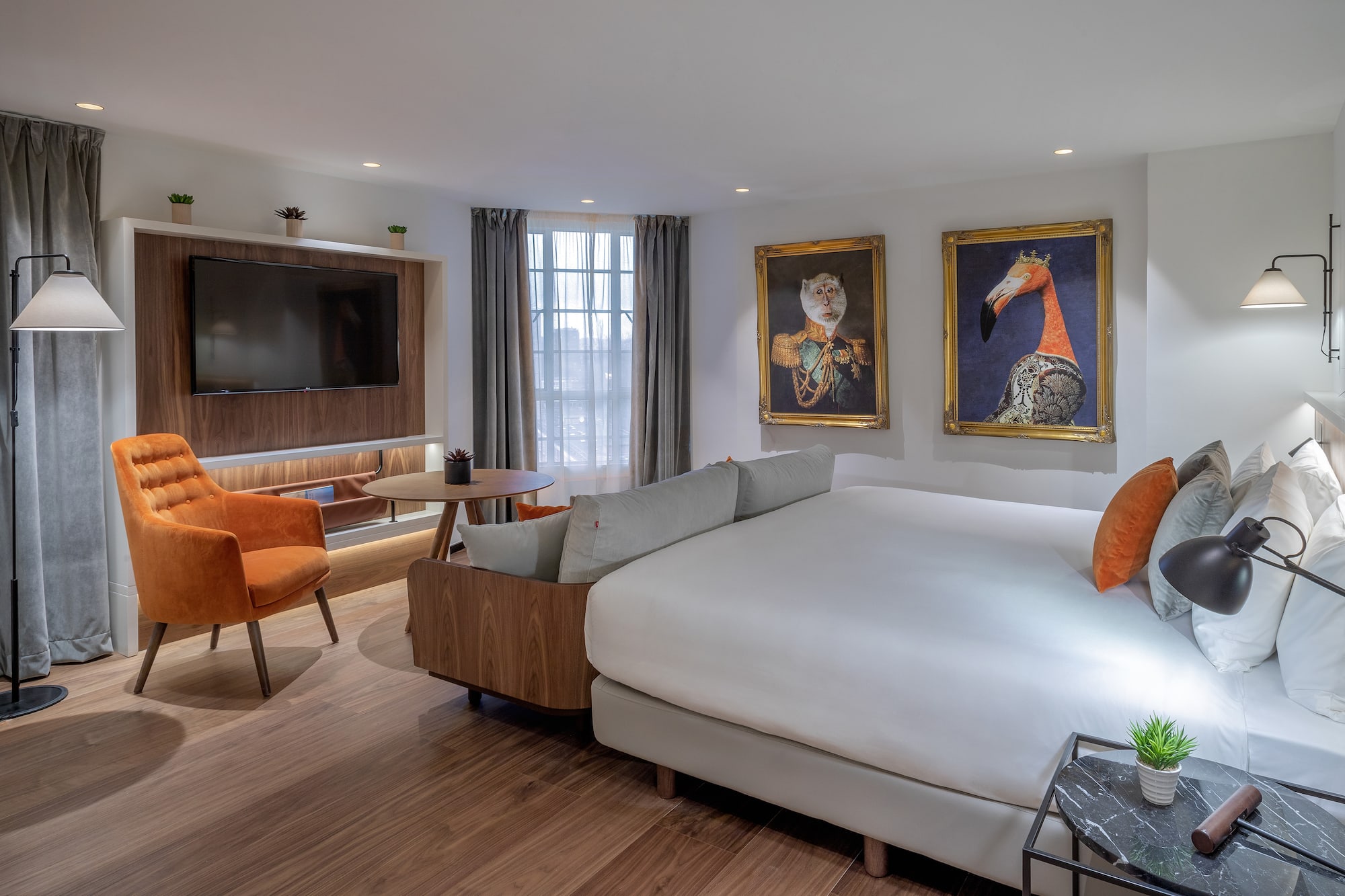 a room with a bed and a television