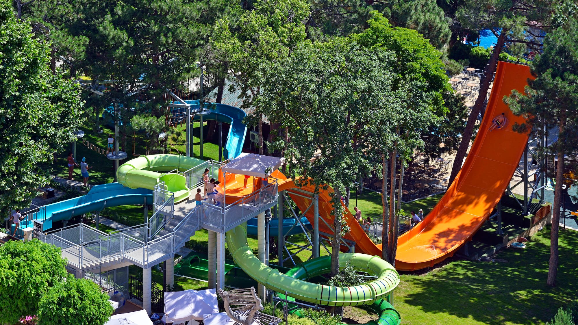 a water park with slides and trees