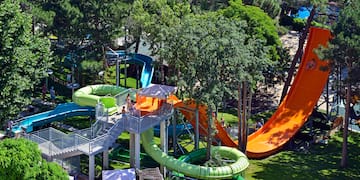 a water park with slides and trees