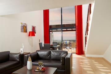 a living room with a couch and a table