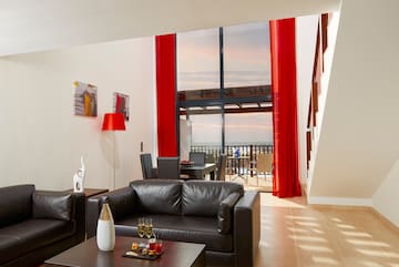 a living room with a couch and a table