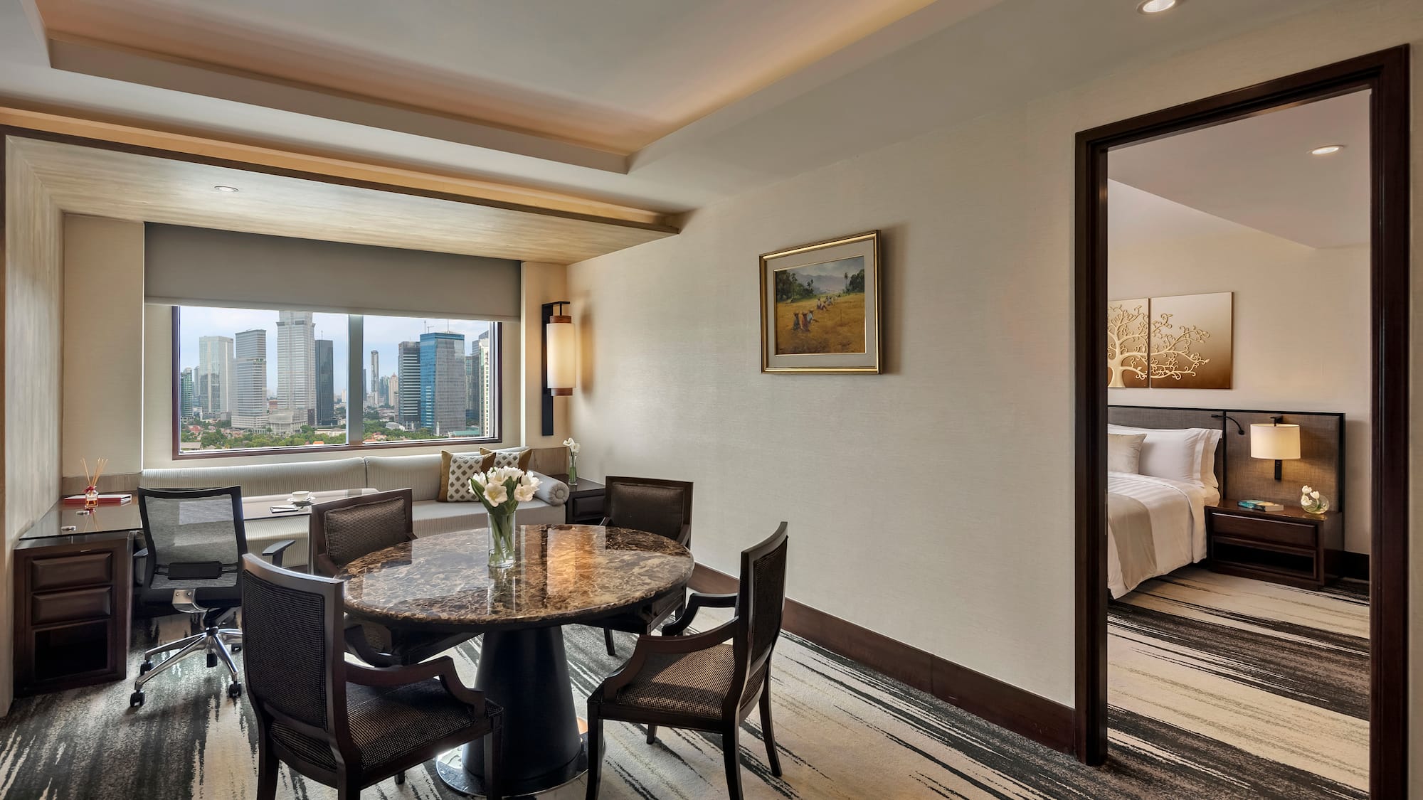 a room with a table and chairs