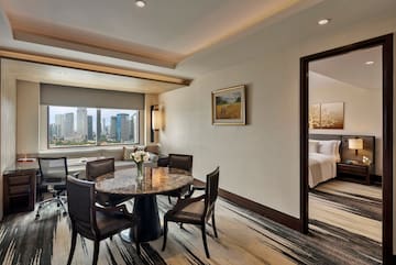 a room with a table and chairs