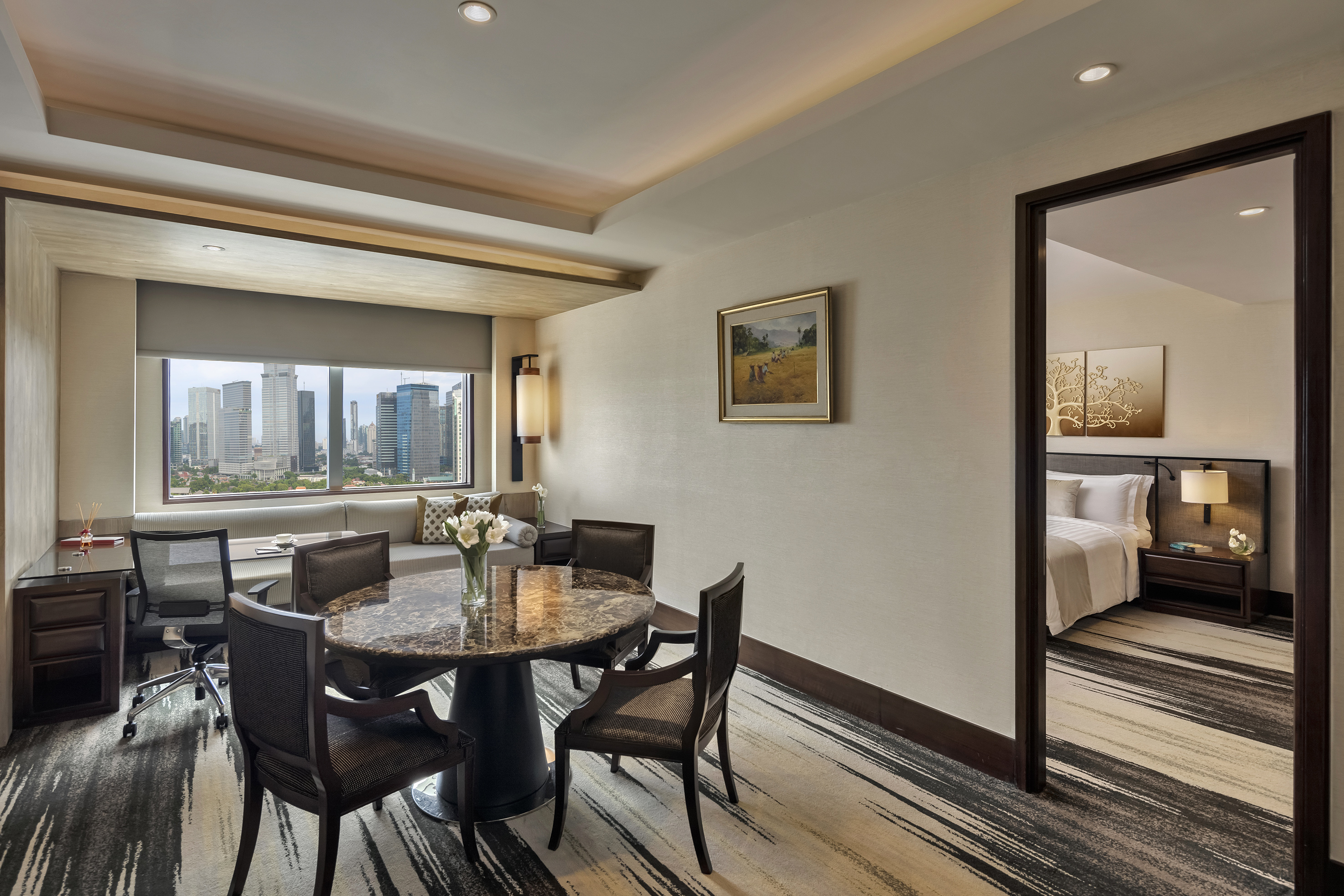 a room with a table and chairs